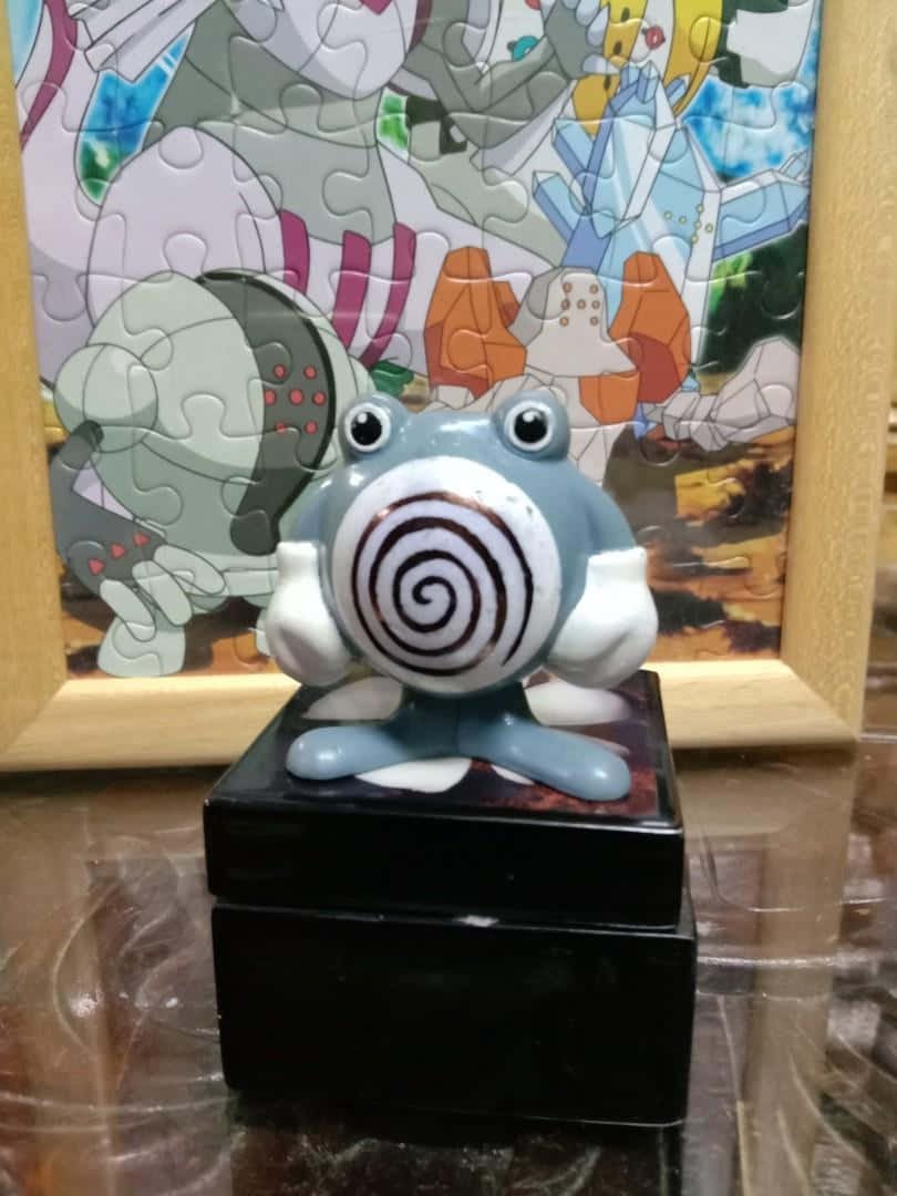 Keramisk Poliwhirl-statue Wallpapers