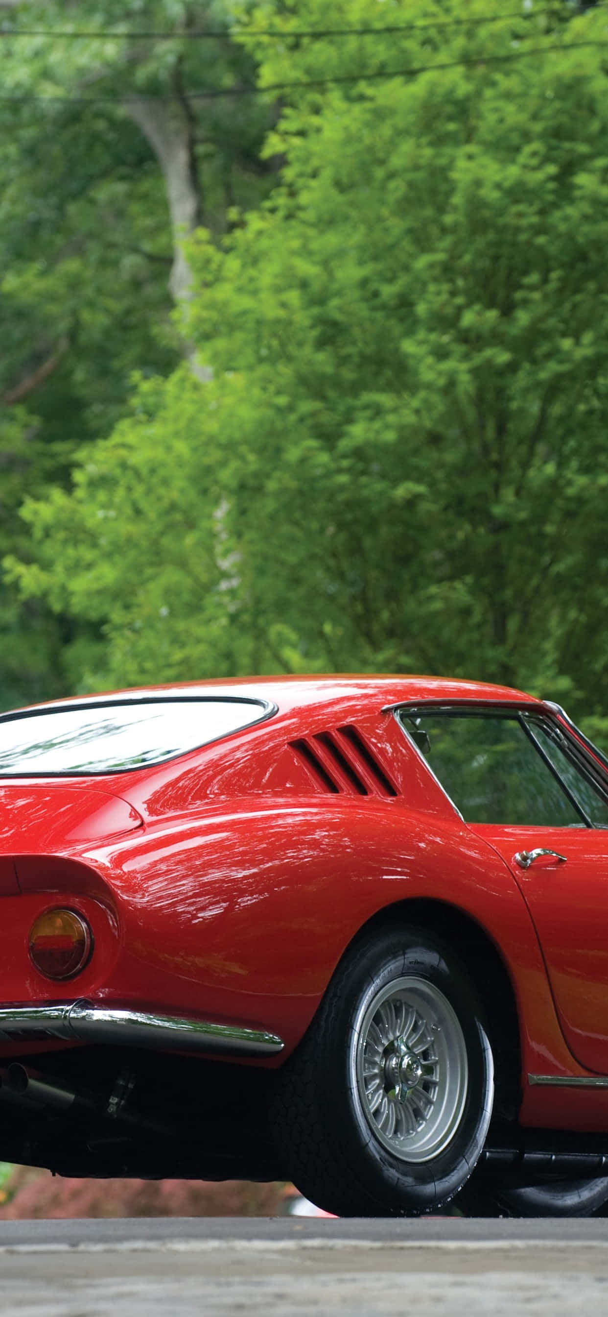 "Klassisk Ferrari, et symbol på luksus, kraft og fart." Wallpapers