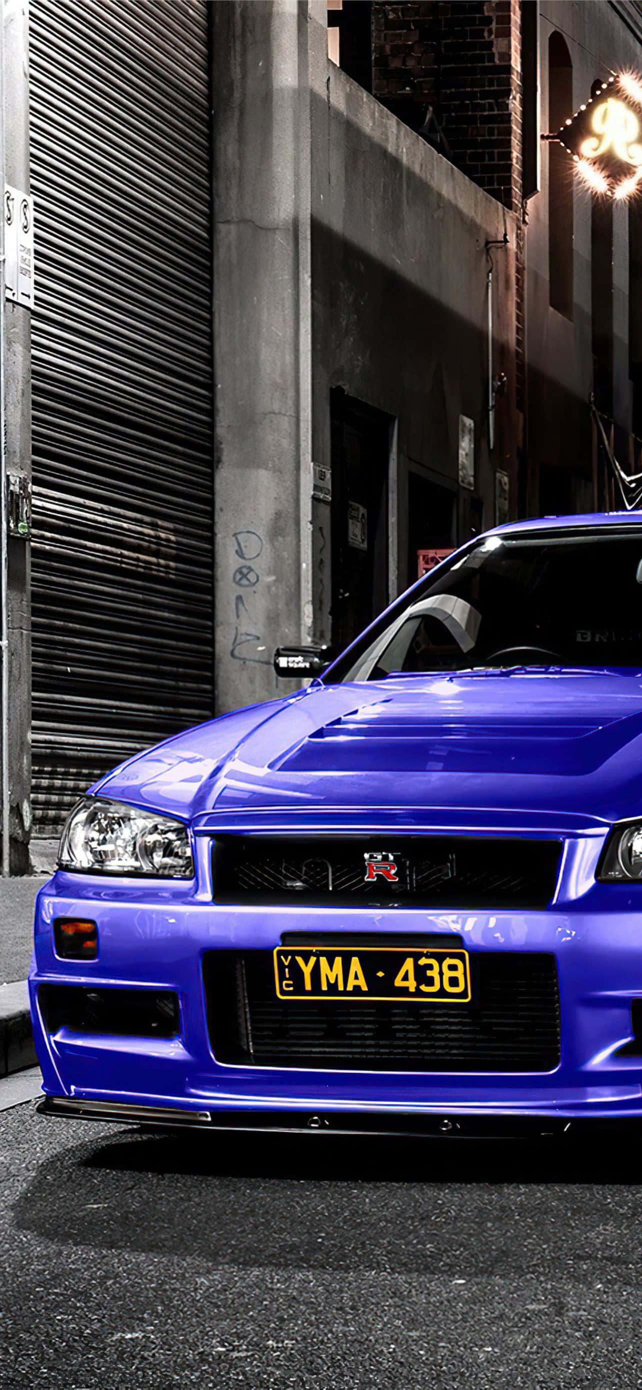 Kør på et nyt niveau af hastighed og stil med Nissan Skyline iPhone. Wallpapers