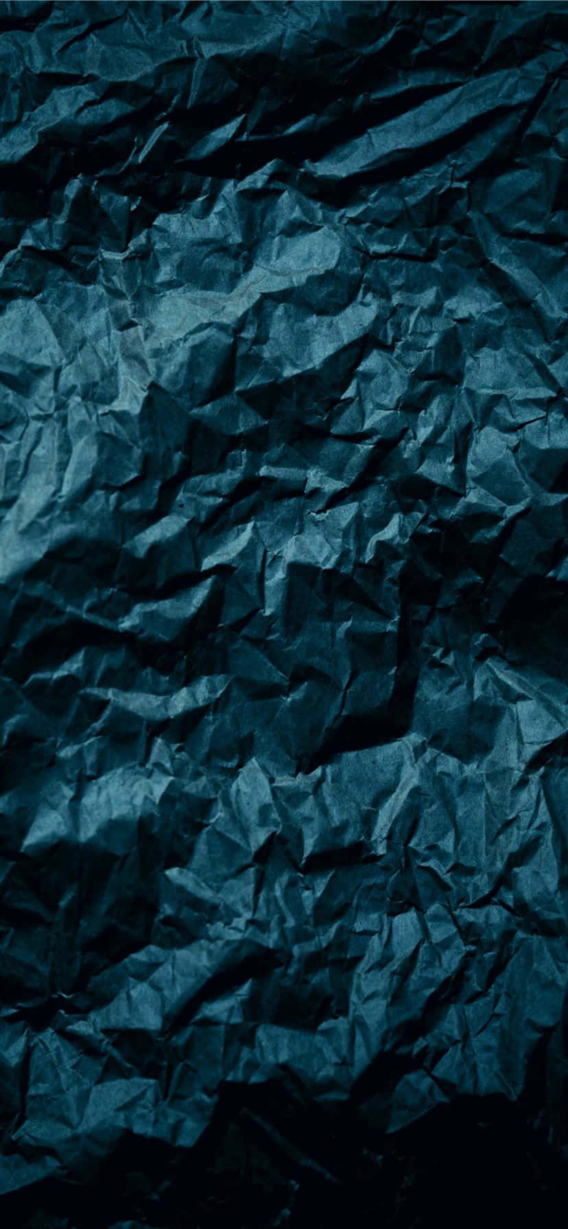Papir krøllet i mørkeblå farve Wallpapers
