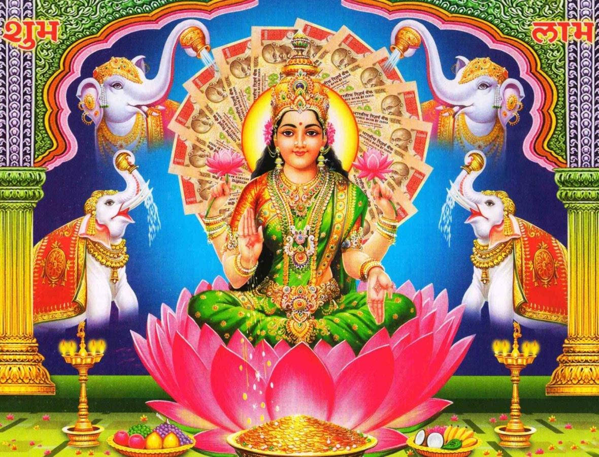 Lakshmi prydet med penge Wallpapers