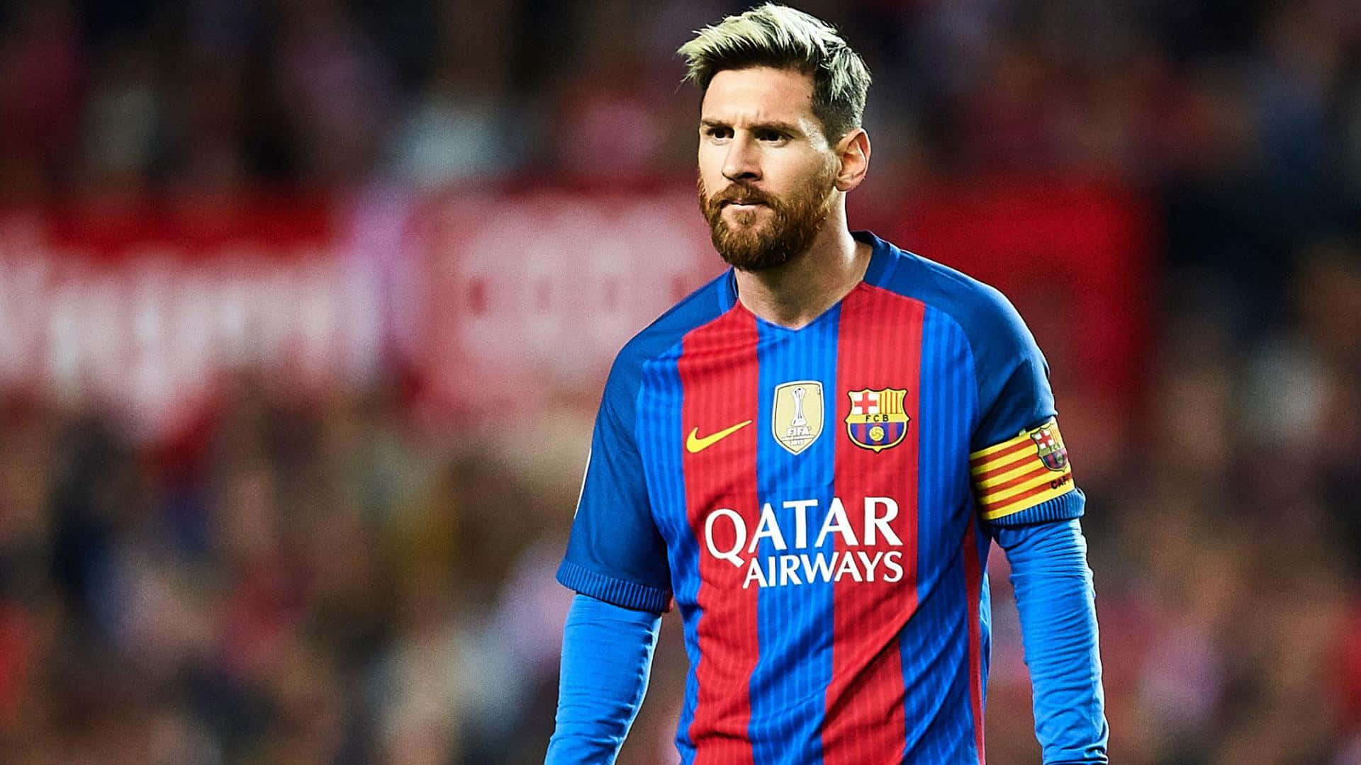 Lionel Messi, kaptajn for FC Barcelona, i et imponerende actionbillede. Wallpapers
