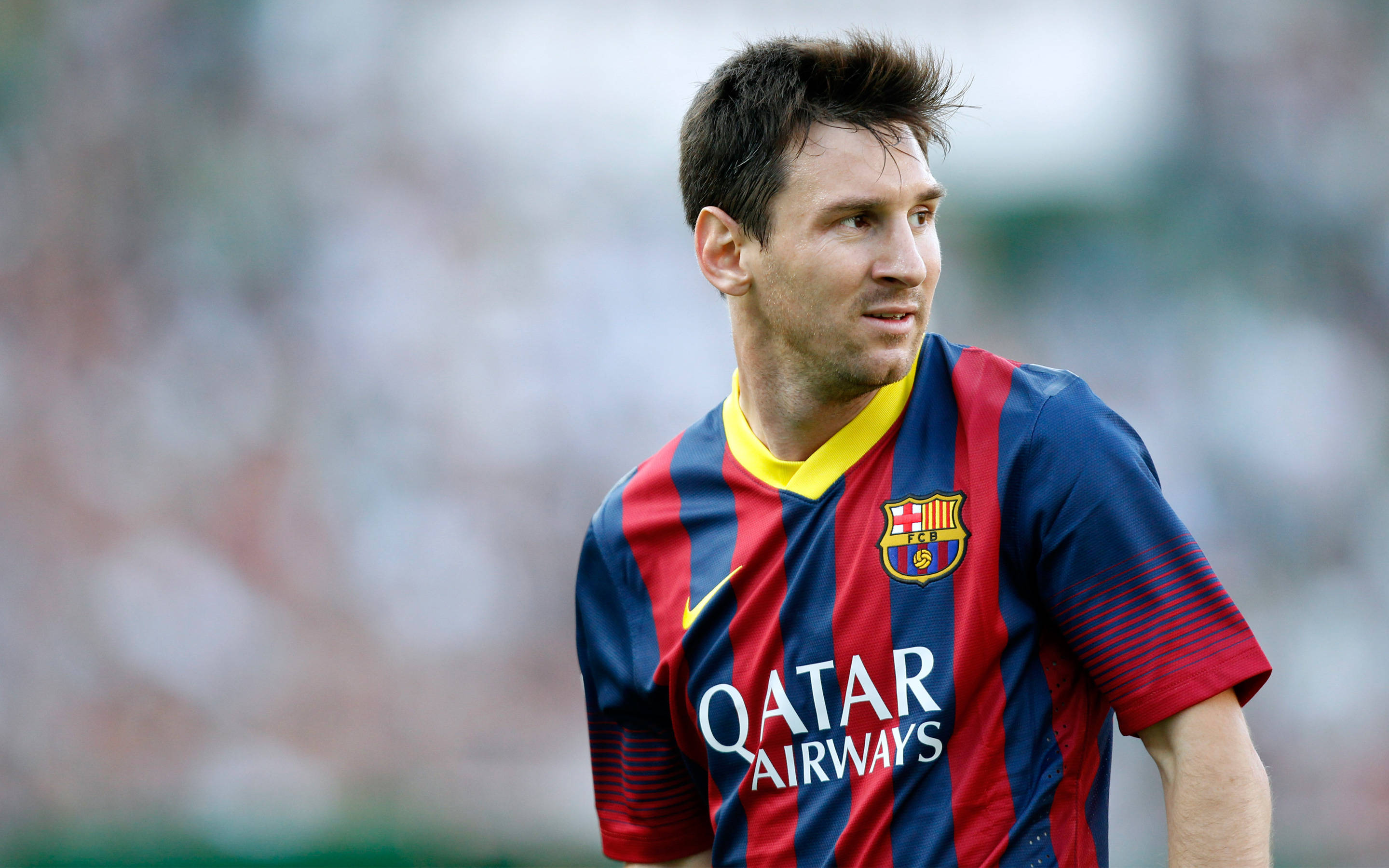 Lionel Messi under en kamp for Barcelona, holdet han kalder sit hjem Wallpapers