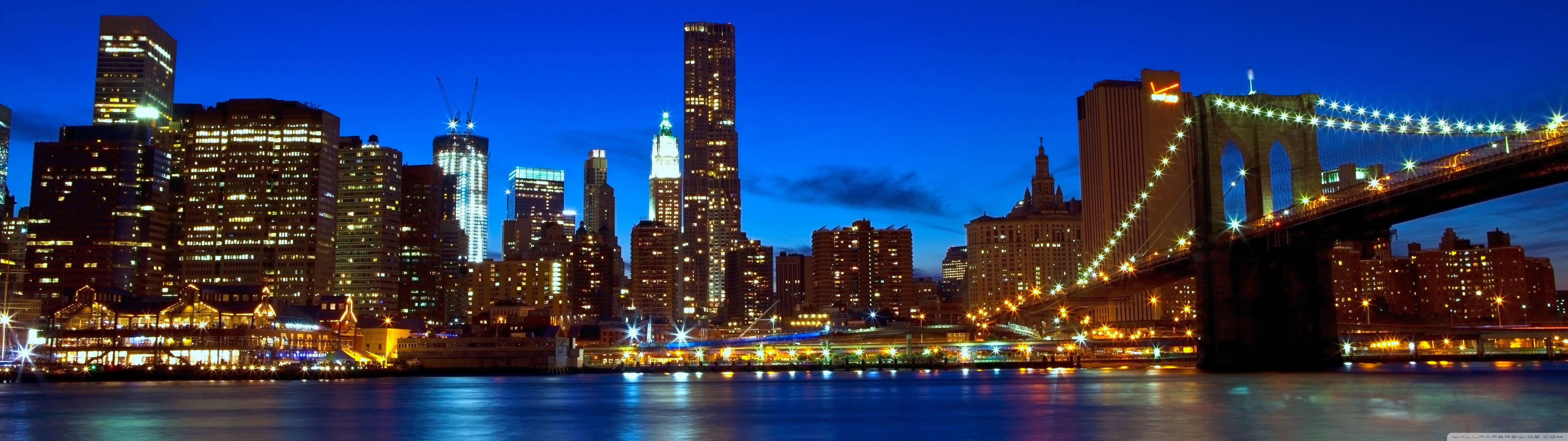 Livligt Manhattan Bysilhuet ved Solnedgang Wallpapers