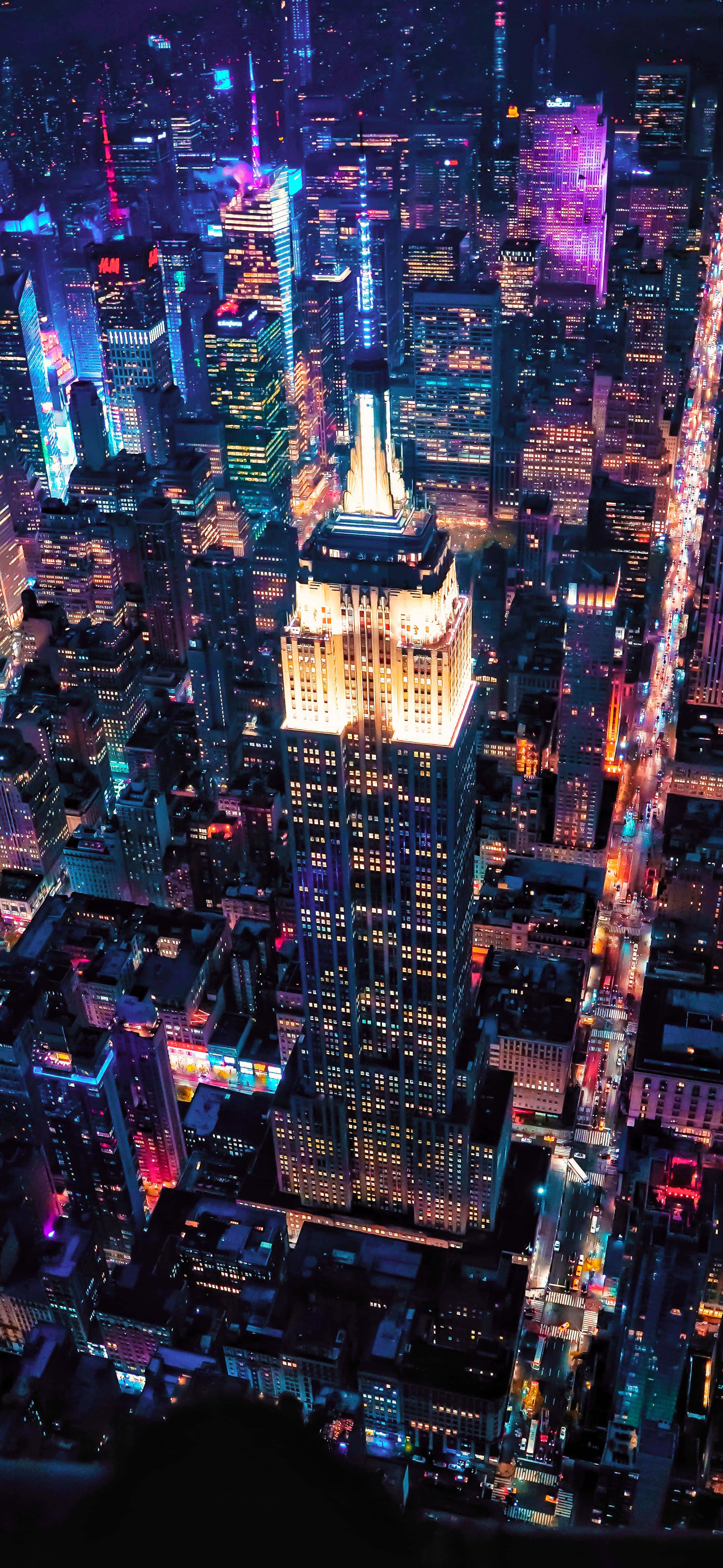 Luftfoto af de mørke bygninger i byen 4K telefonbaggrund Wallpapers