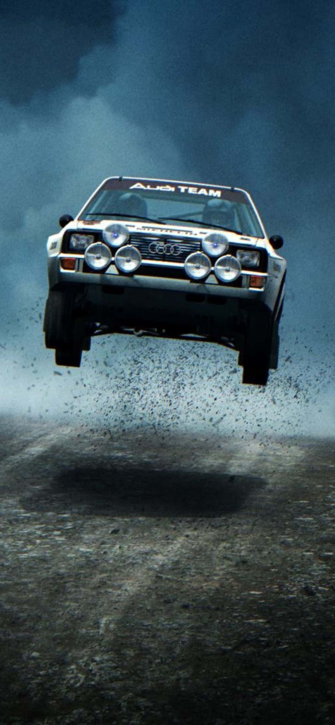 Mærk spændingsrushet med iPhone Xs Dirt Rally Wallpapers