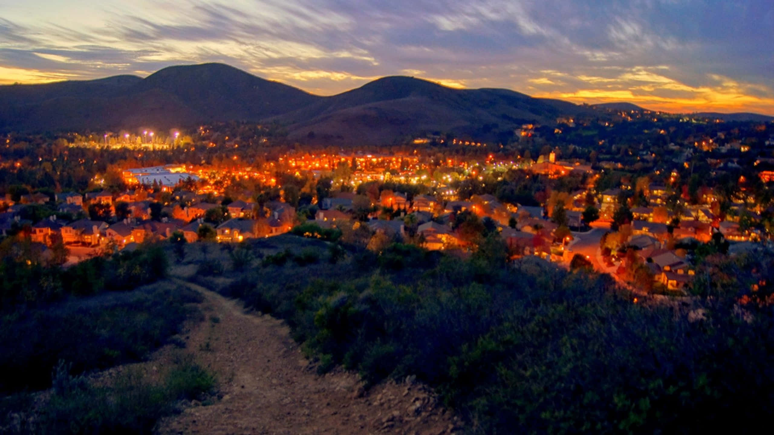 Malibu bysolnedgang i 1440p Wallpapers