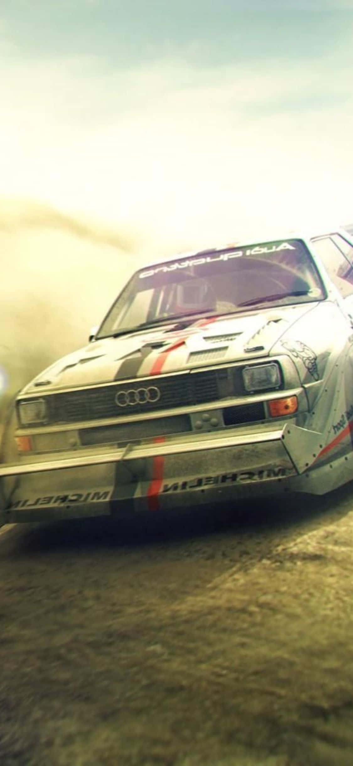 Modige førere tager udfordringen op i Dirt Rally på iPhone Xs Wallpapers