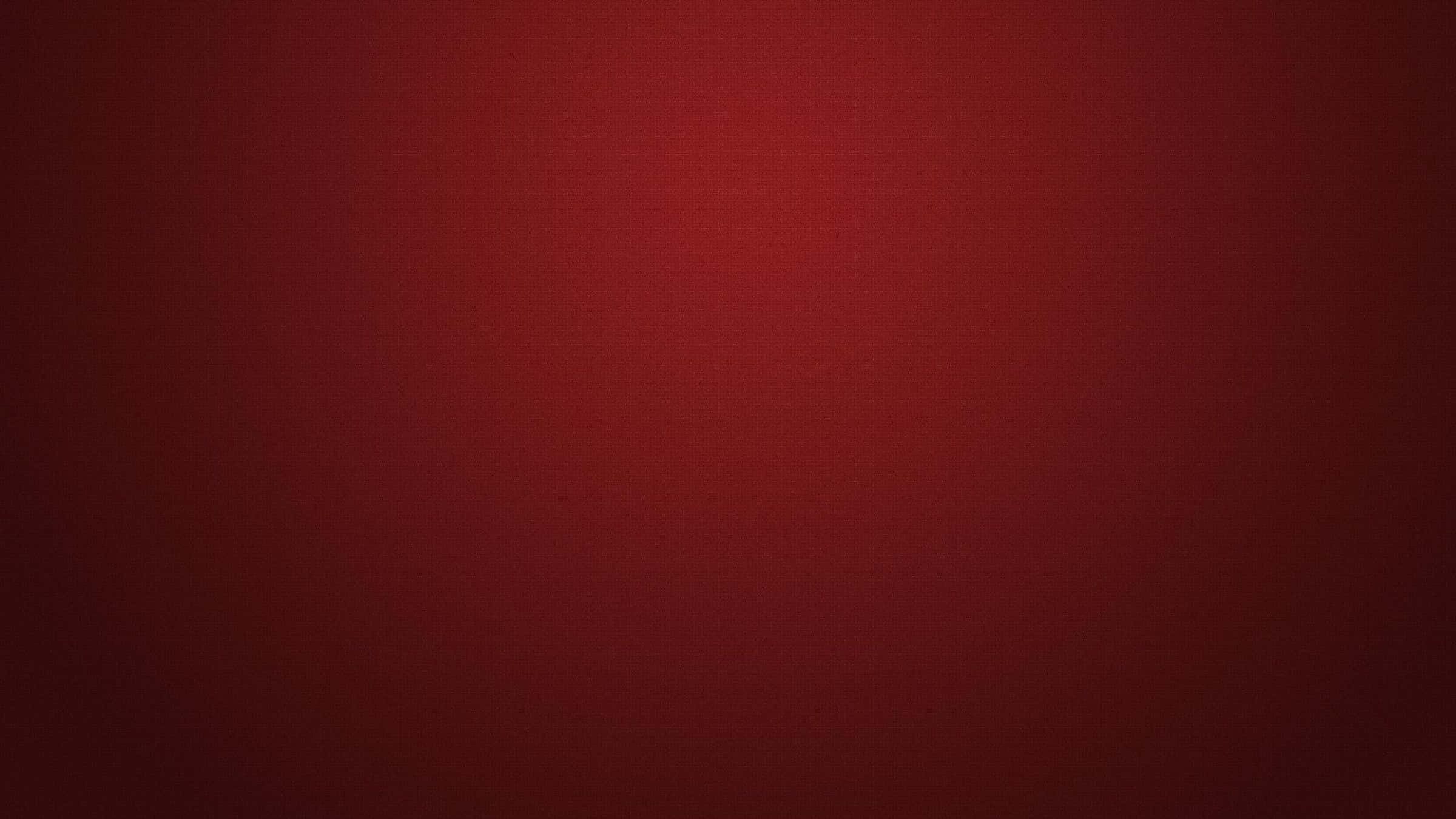 Mørkerød baggrund med mørkerøde hjørner og lys midte Wallpapers