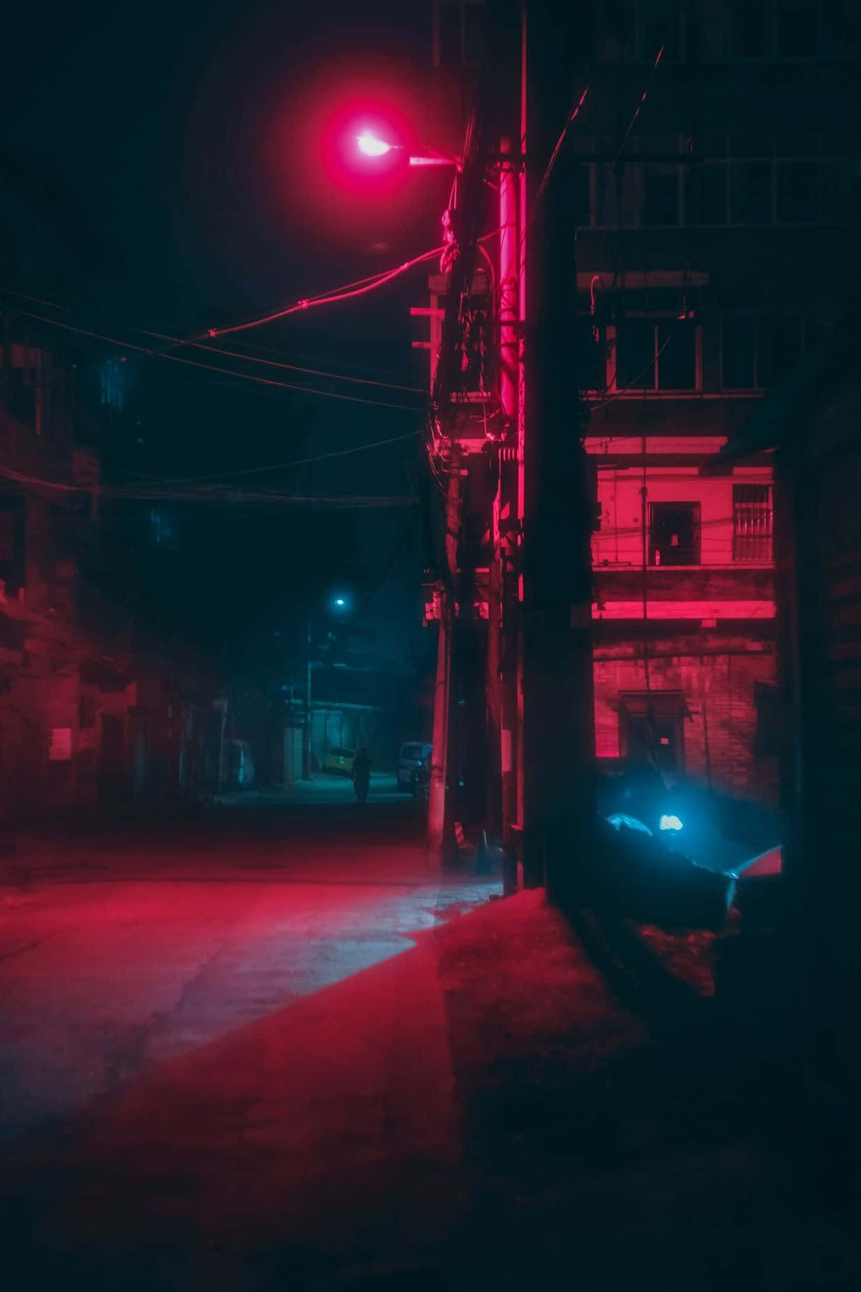 Neonrød æstetisk lys oplyser en gade Wallpapers