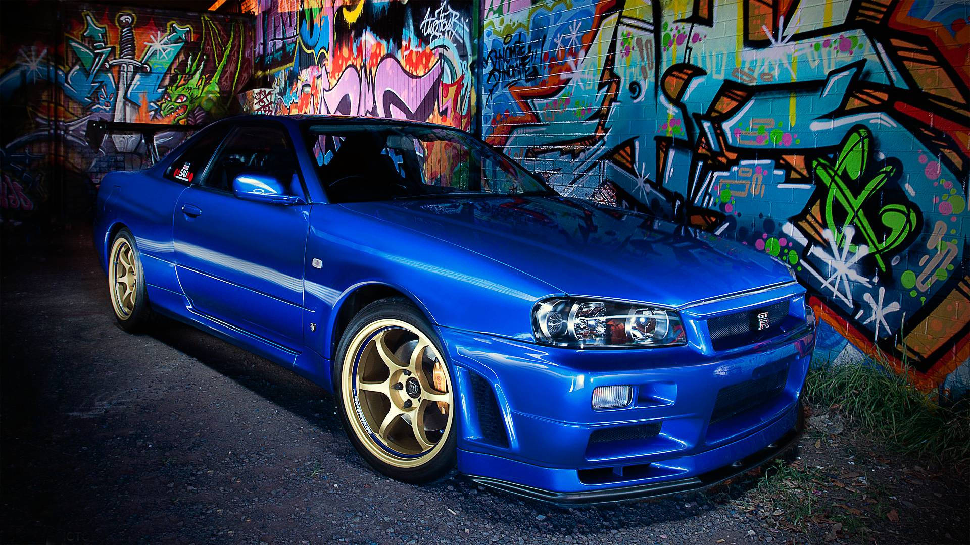 Nissan Skyline GTR R34 nær graffiti Wallpapers
