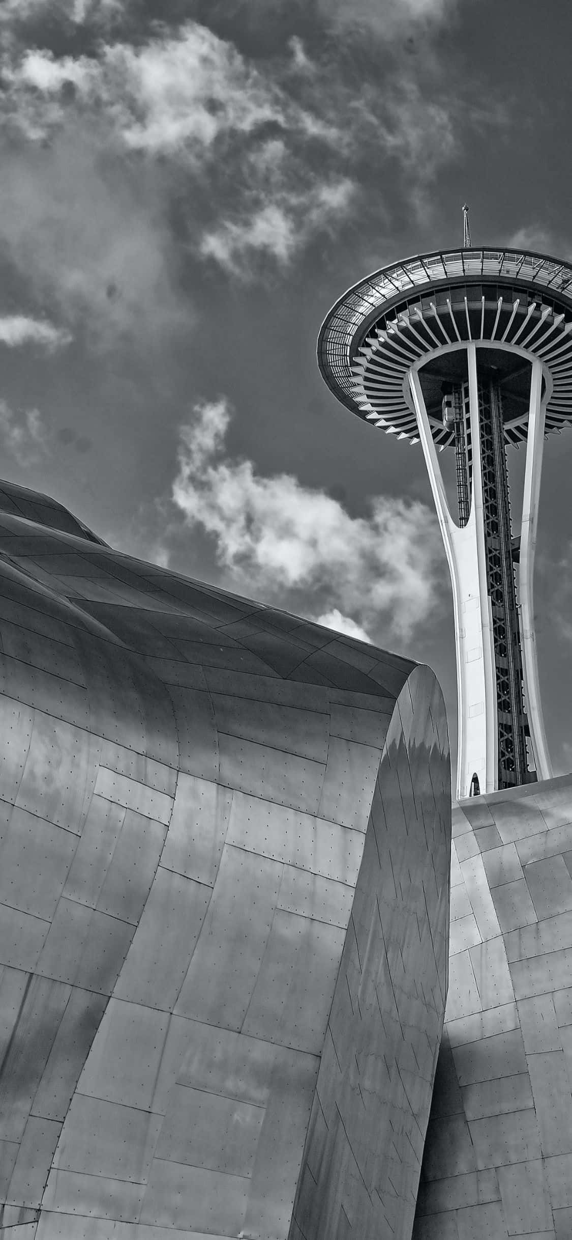 Nyd den fantastiske Seattle-himmel og ikoniske Space Needle gennem iPhone X's enestående skærm. Wallpapers