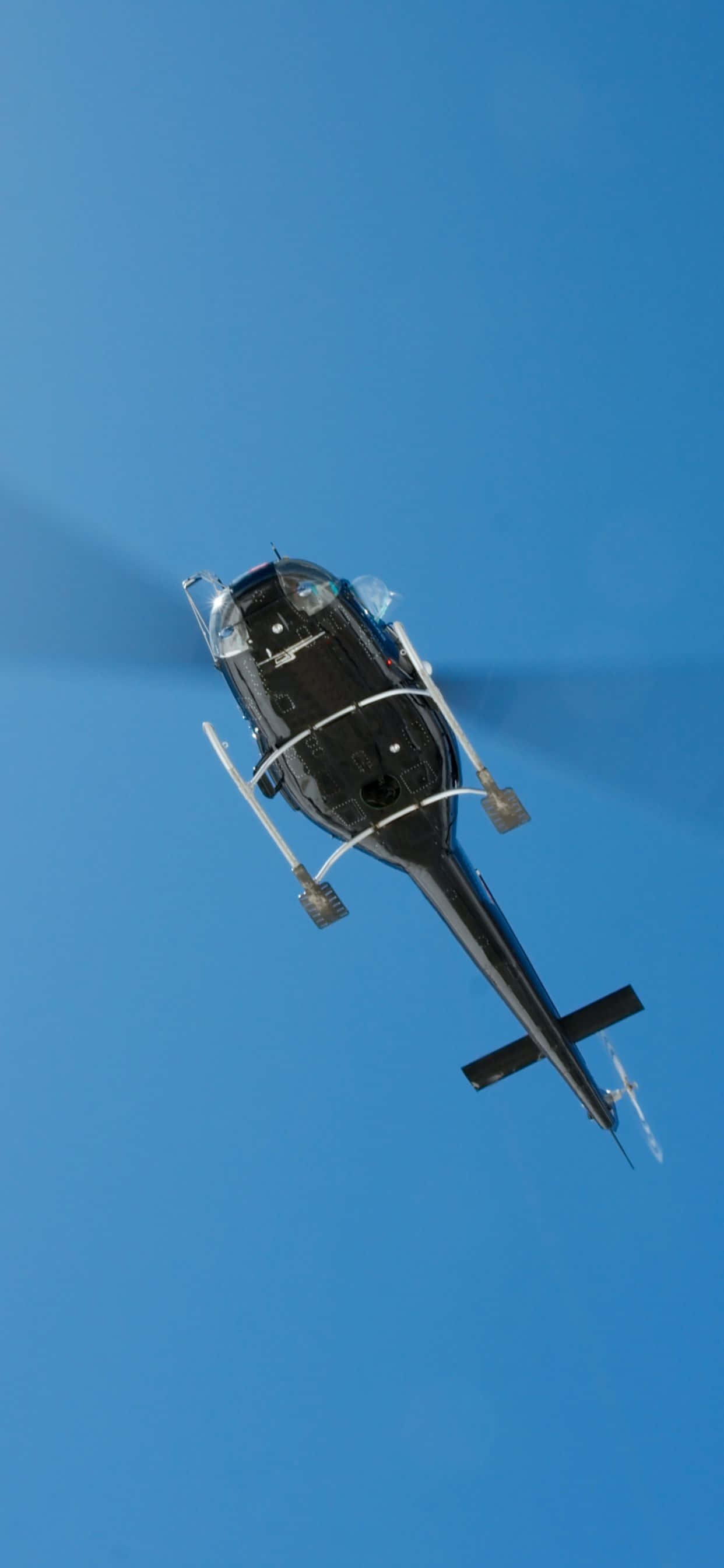 Nyd fantastiske udsigter over himlen i en iPhone Xs Max Helikopter! Wallpapers