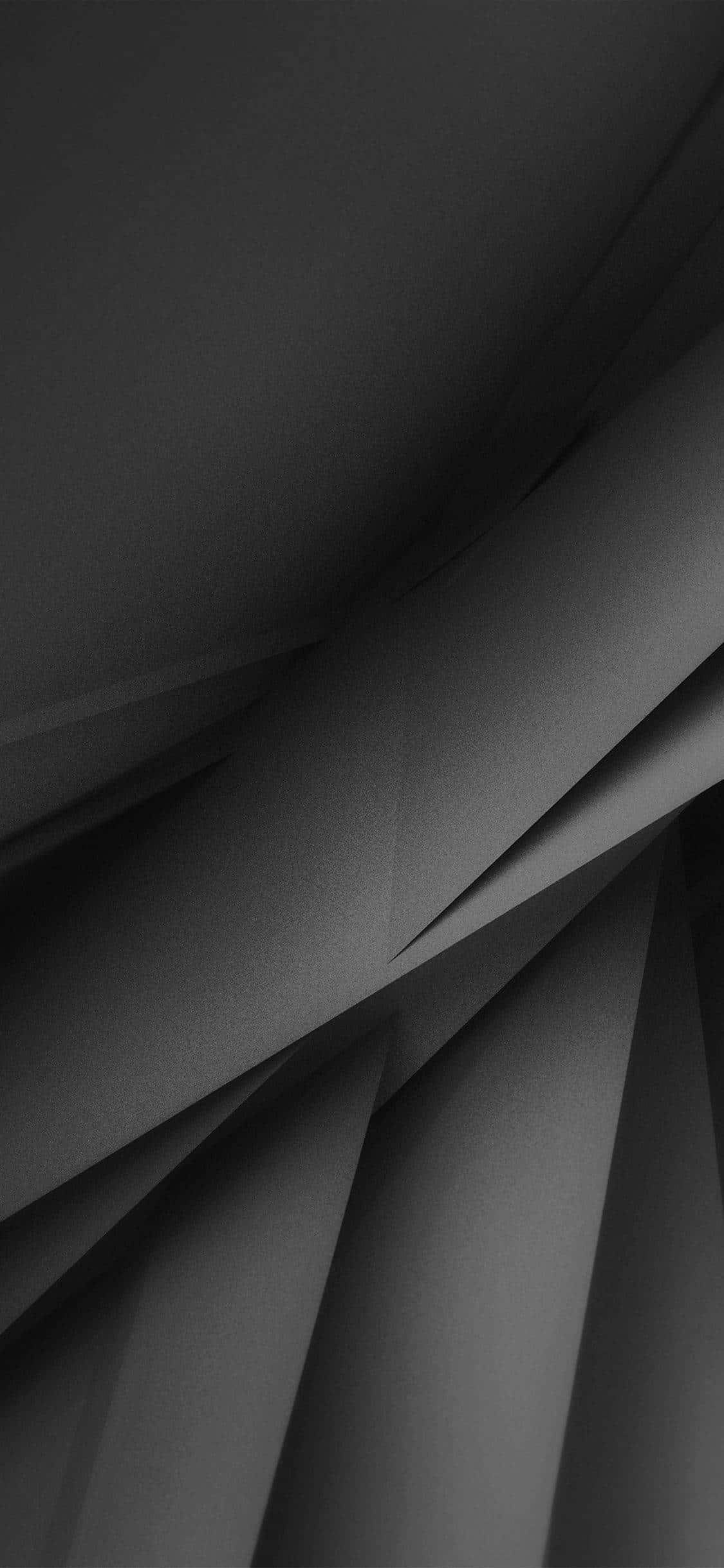 Opgrader din oplevelse med en mørk iPhone Wallpapers