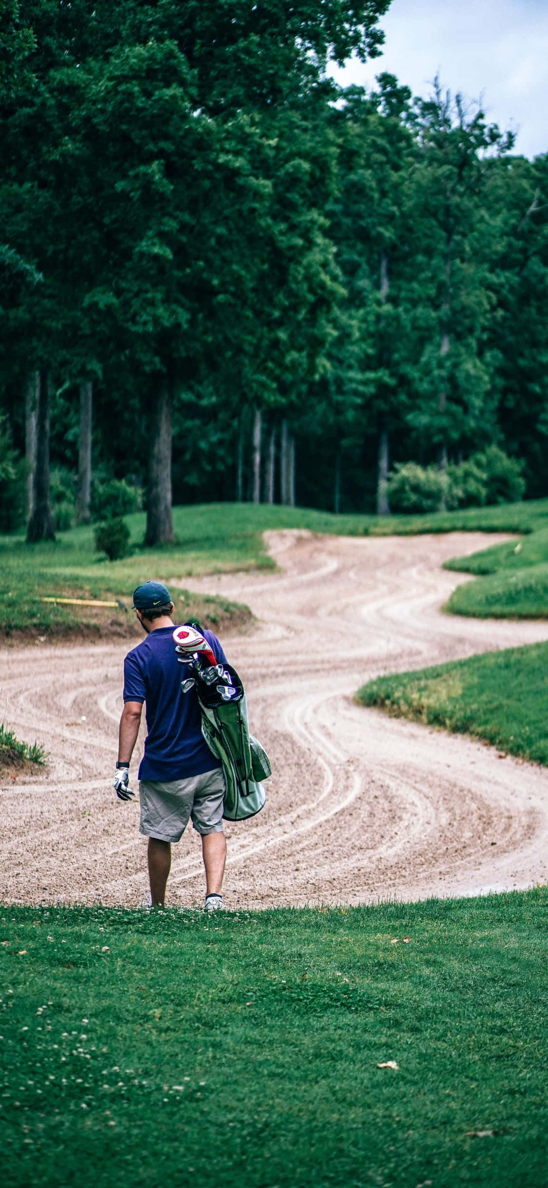 Oplev det ultimative inden for golf-luksus med iPhone X på en frodig golfbane Wallpapers