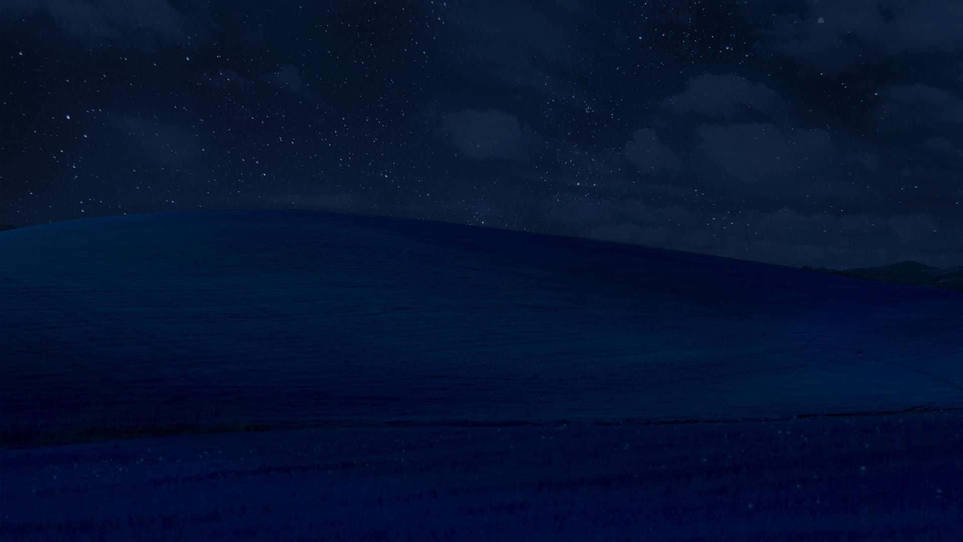 Oplev en ny dimension af internettet med Dark Mode Wallpapers