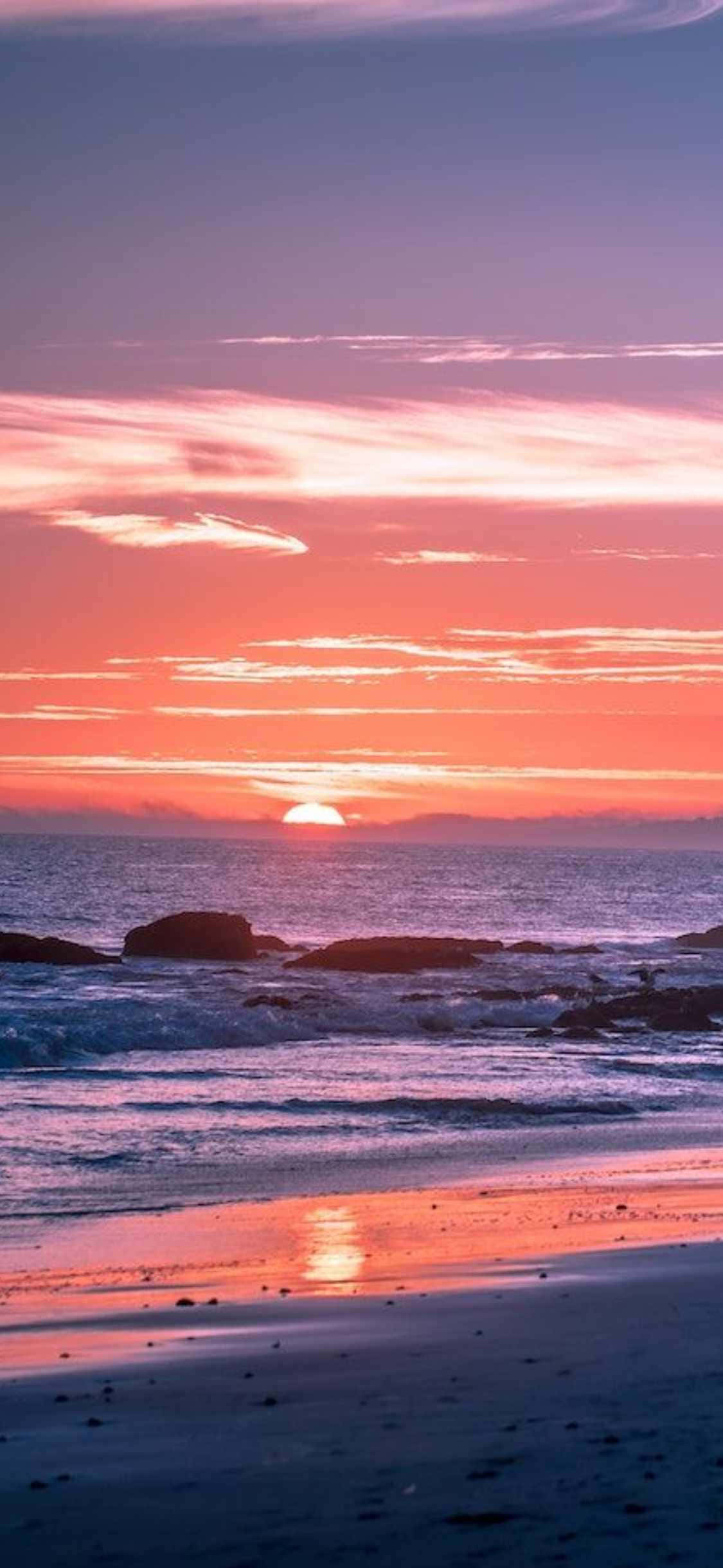Oplev skønheden i Malibu med den nyeste iPhone Xs Wallpapers