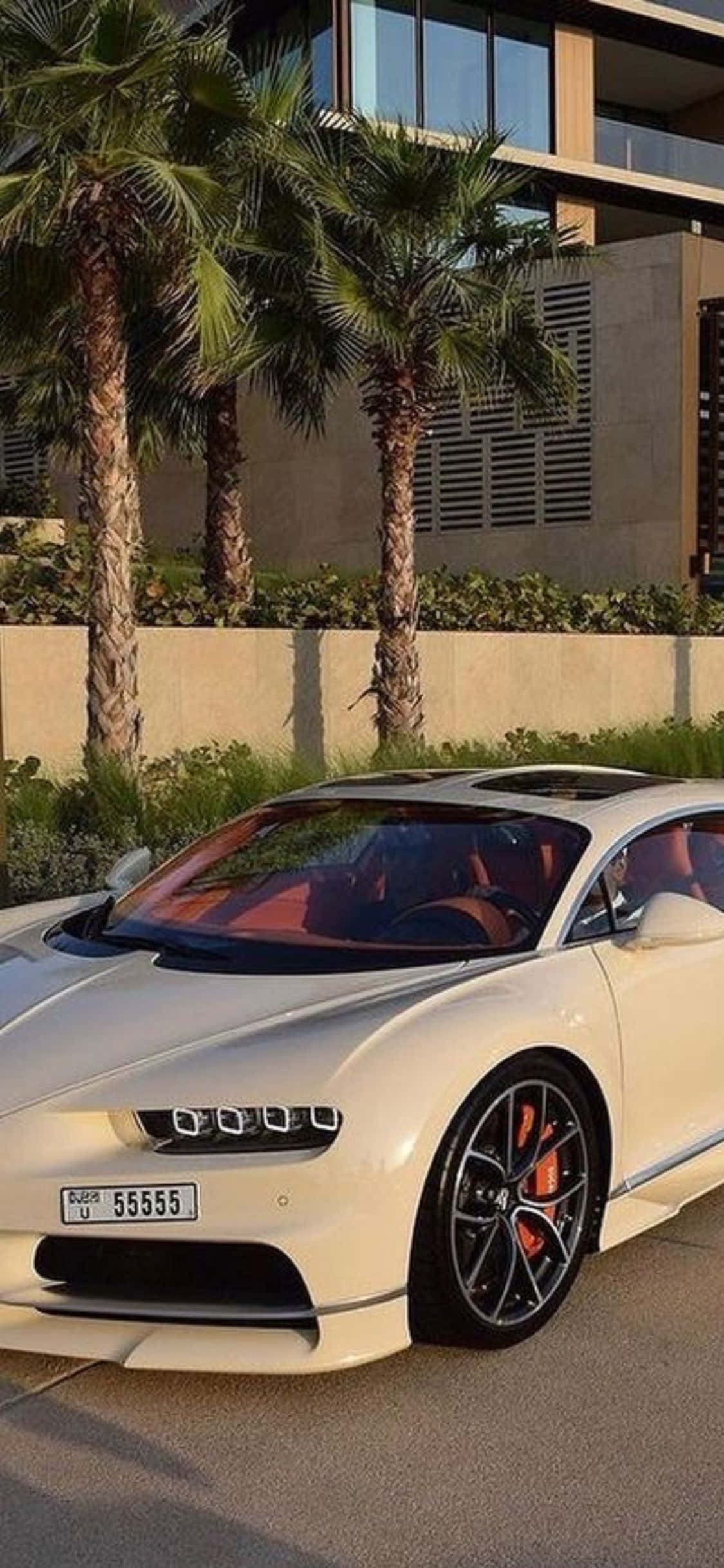 Optimeret luksus: En iPhone XS og en Bugatti Veyron, det perfekte match til den luksuriøse livsstil Wallpapers