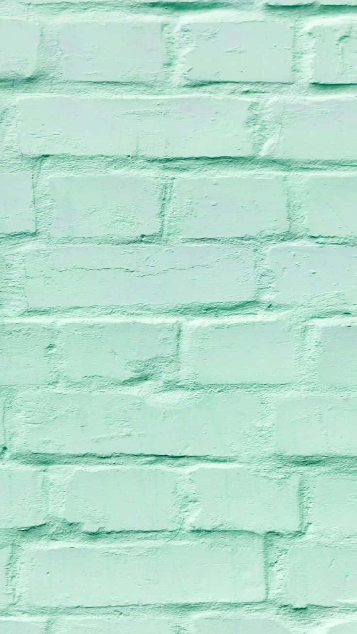 Pastelgrøn baggrund med murstensvægge Wallpapers