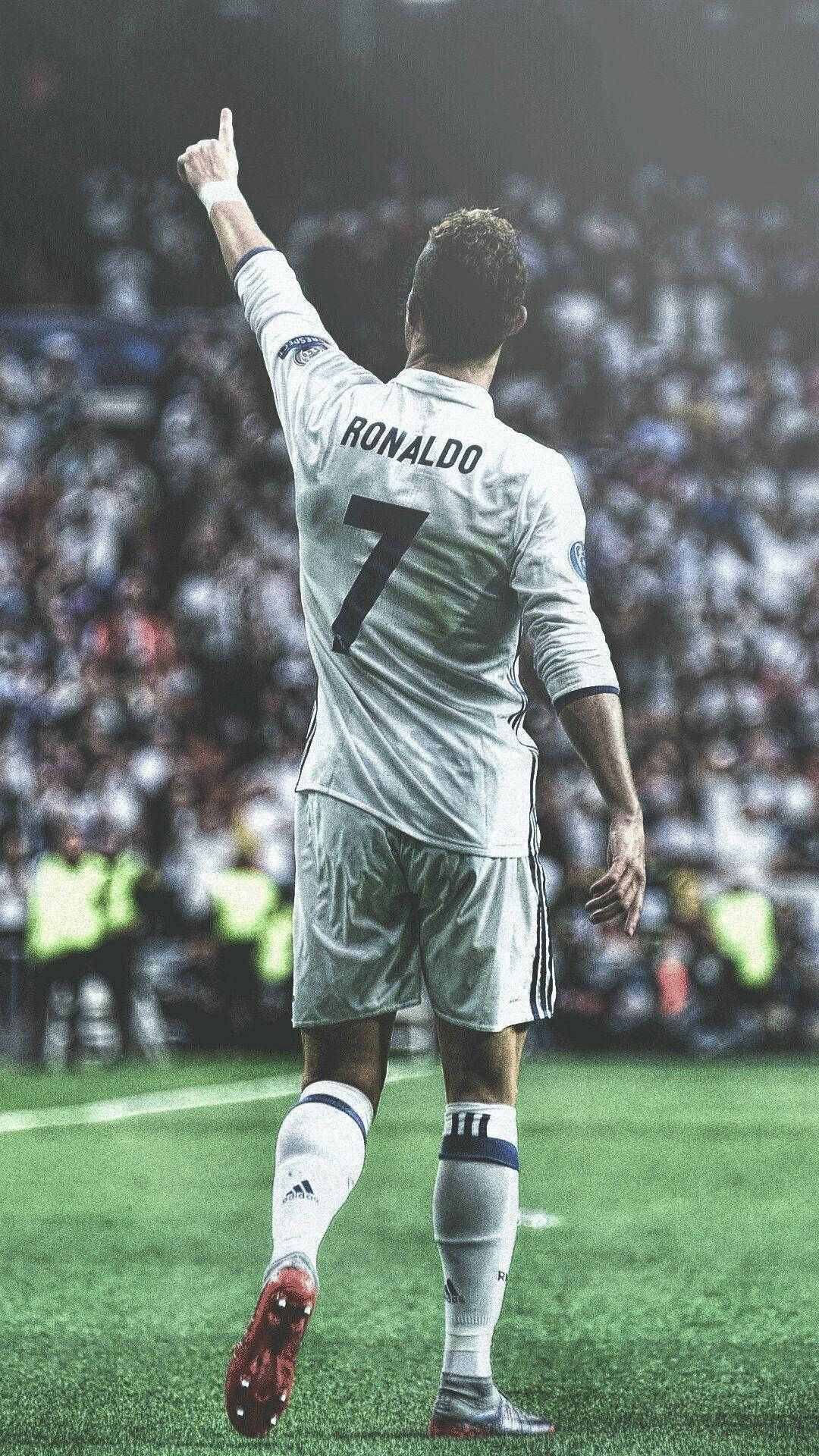 Cristiano Ronaldo peger opad iPhone Wallpapers