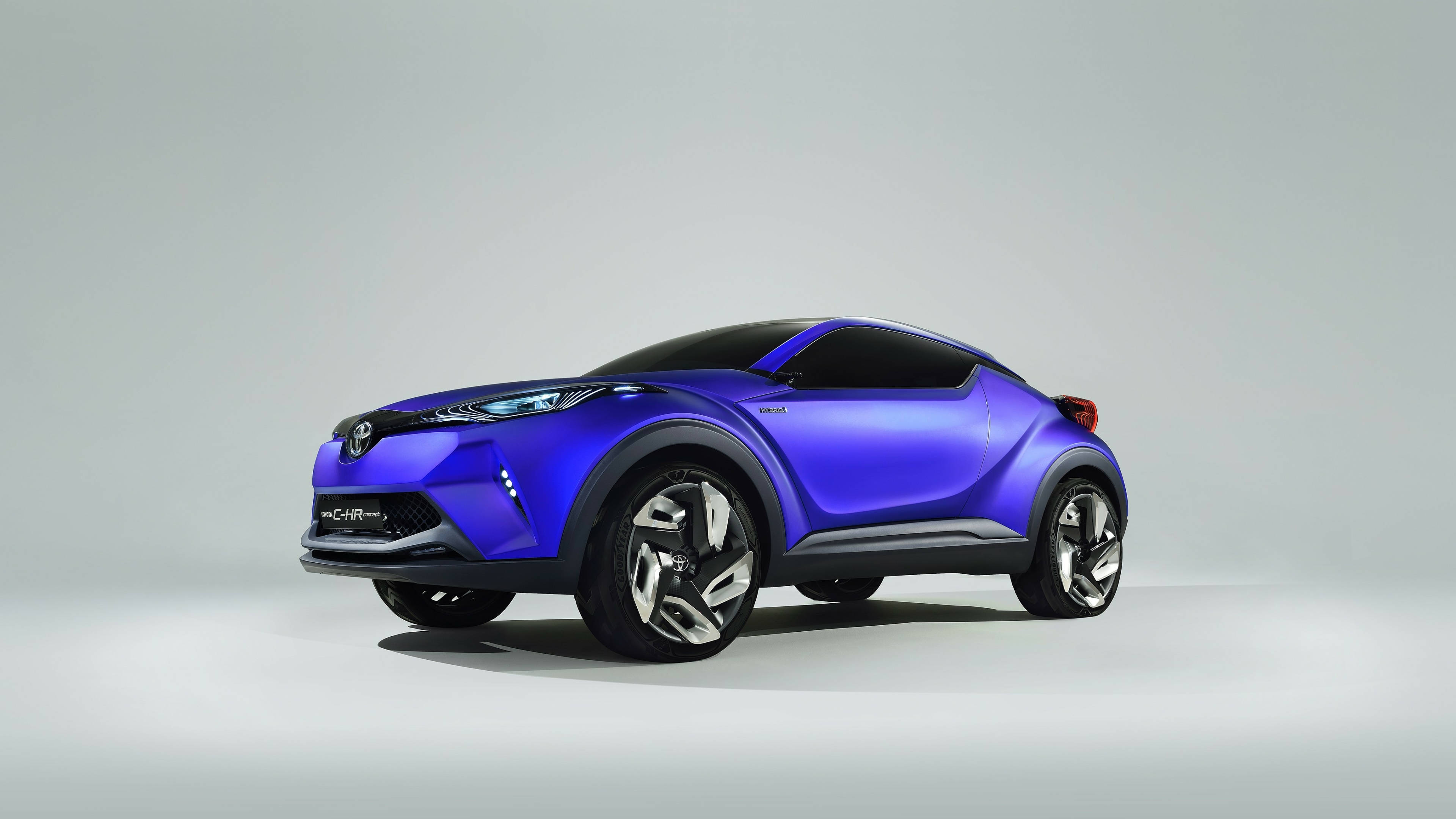 Sidevisning af blå Toyota CH-R 4K Wallpapers