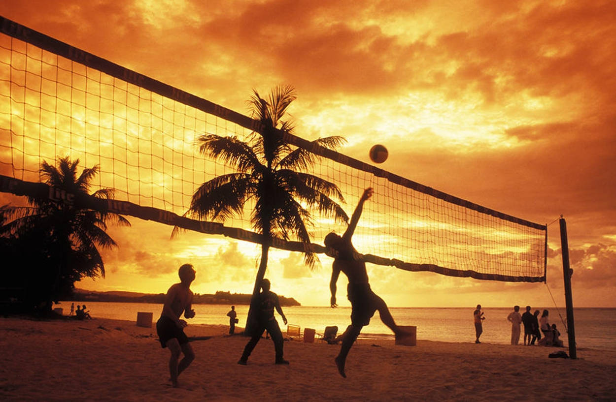 Silhuet af beachvolley og orange himmel Wallpapers