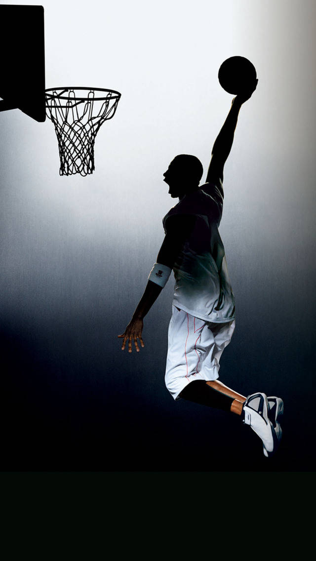 Silhuet af en mand, der dunker en basketball sports iPhone Wallpapers