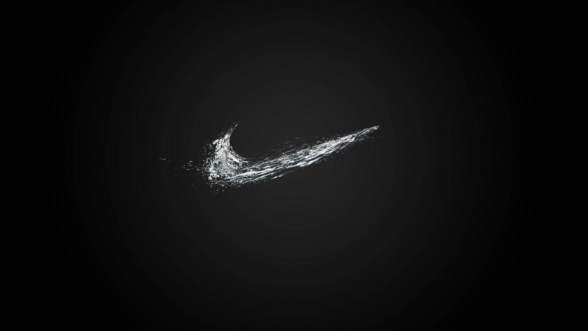 Simpelt Nike-logo Cool Sort Stregfigur Kigger på Computer Wallpapers