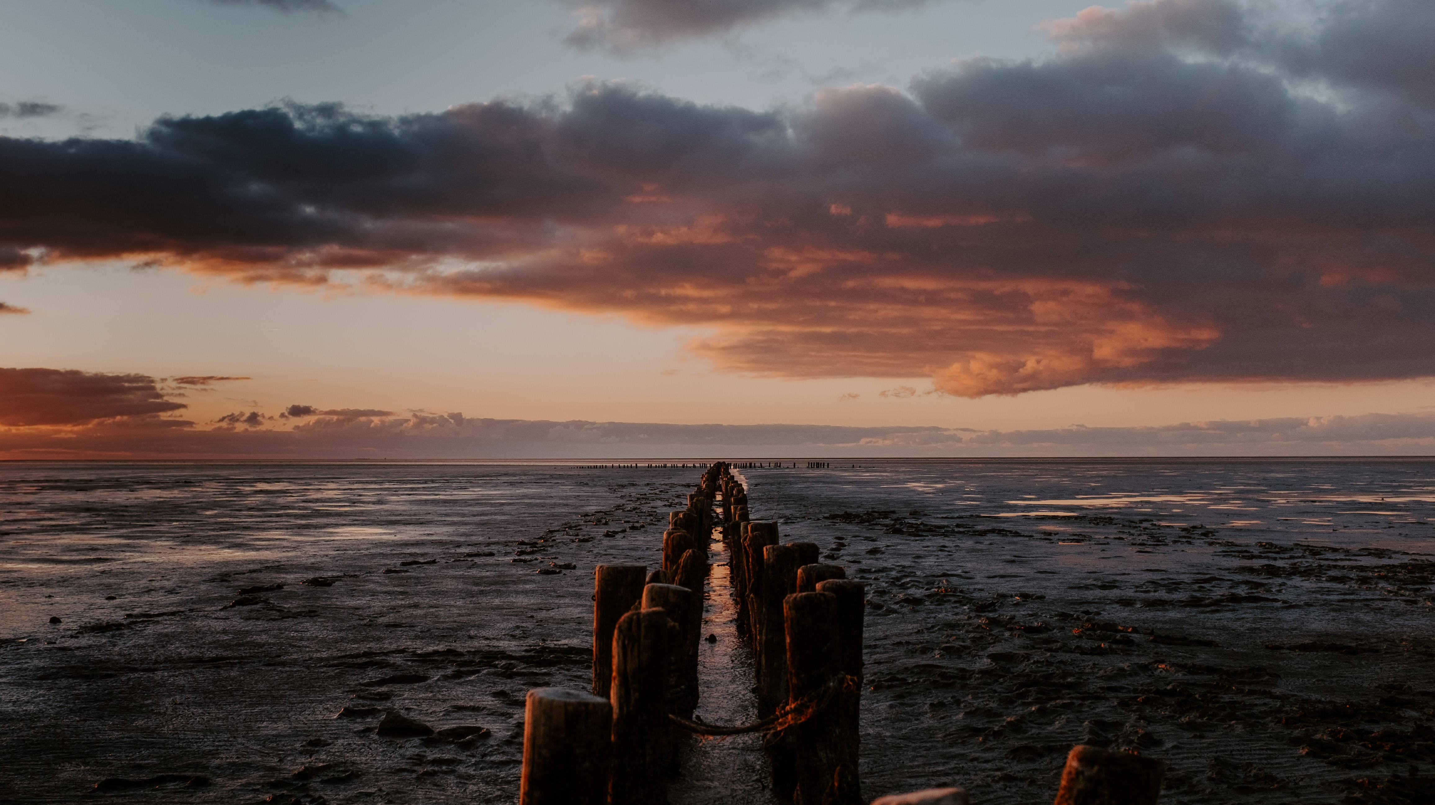 Skønheden ved en solnedgang over havet Wallpapers