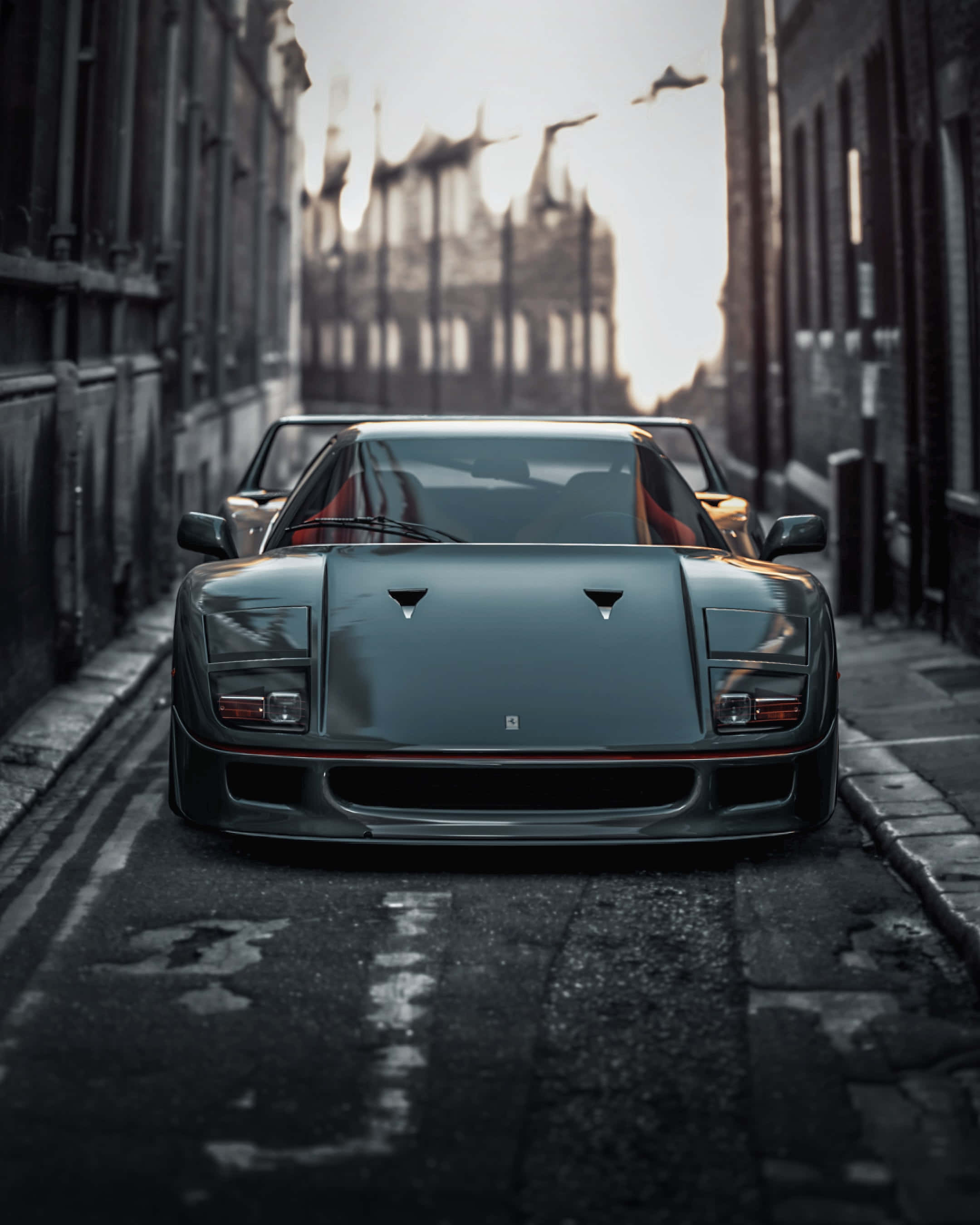 Slank Ferrari-præstationsmaskine mod en himmelblå baggrund Wallpapers