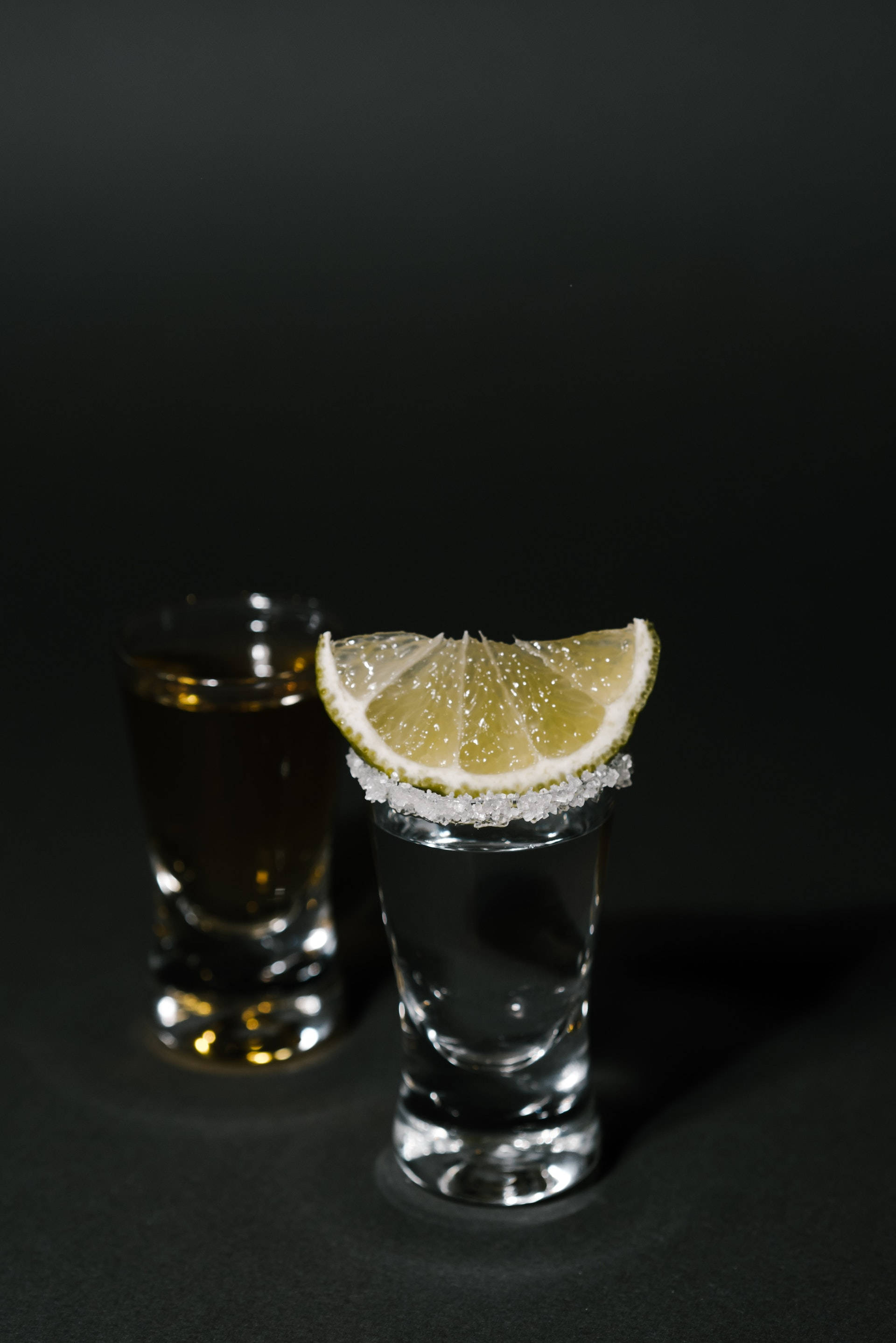 Sølv og guld tequila- og citronskud Wallpapers