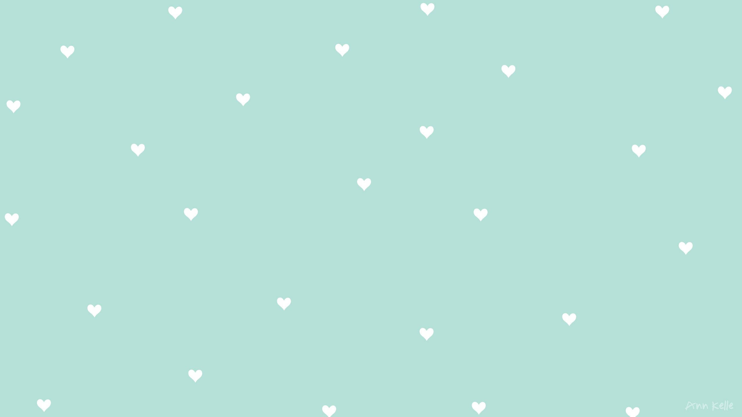 Små hjerter på pastelgrøn Wallpapers