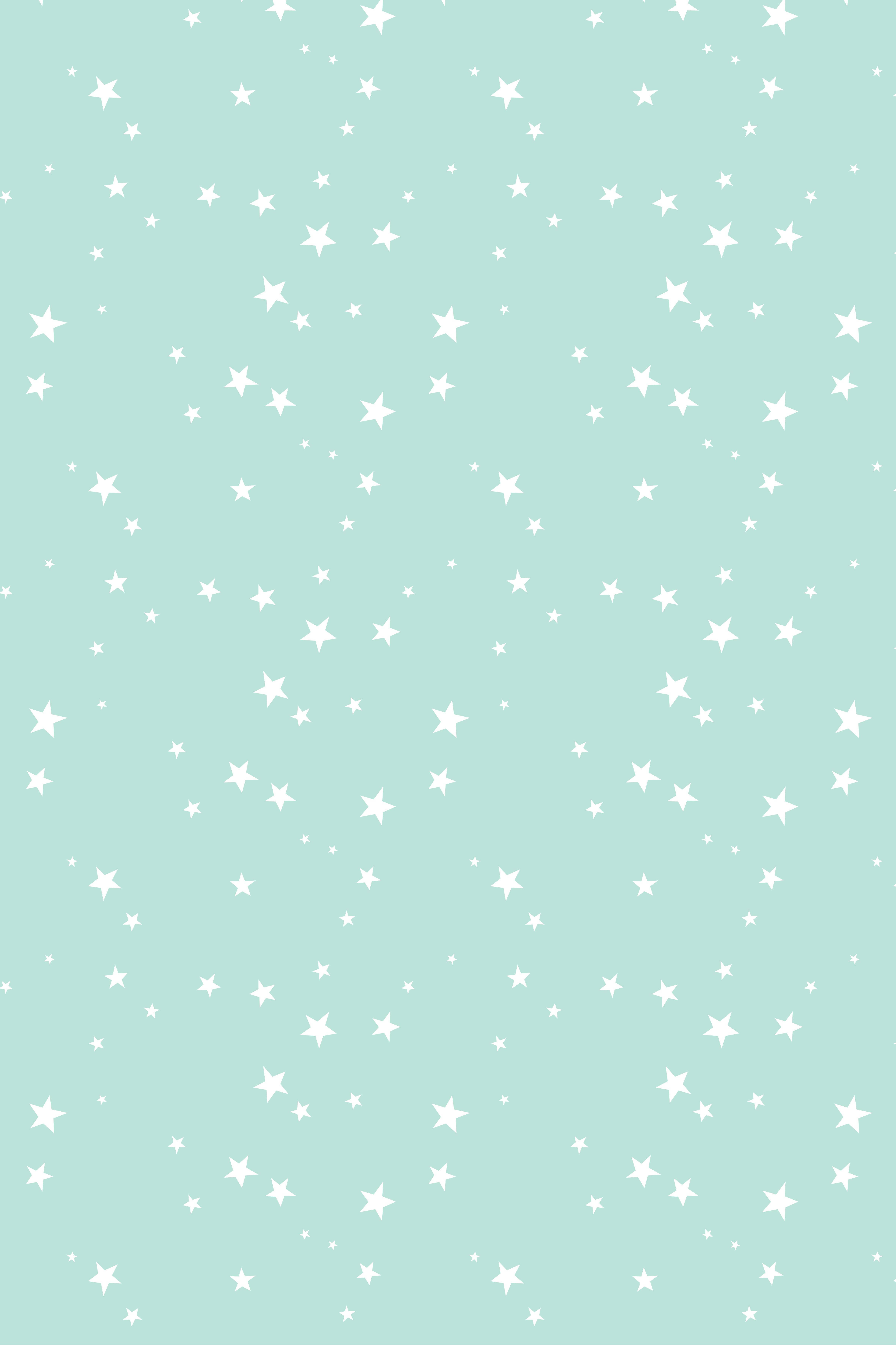 Små hvide stjerner på pastelgrøn Wallpapers