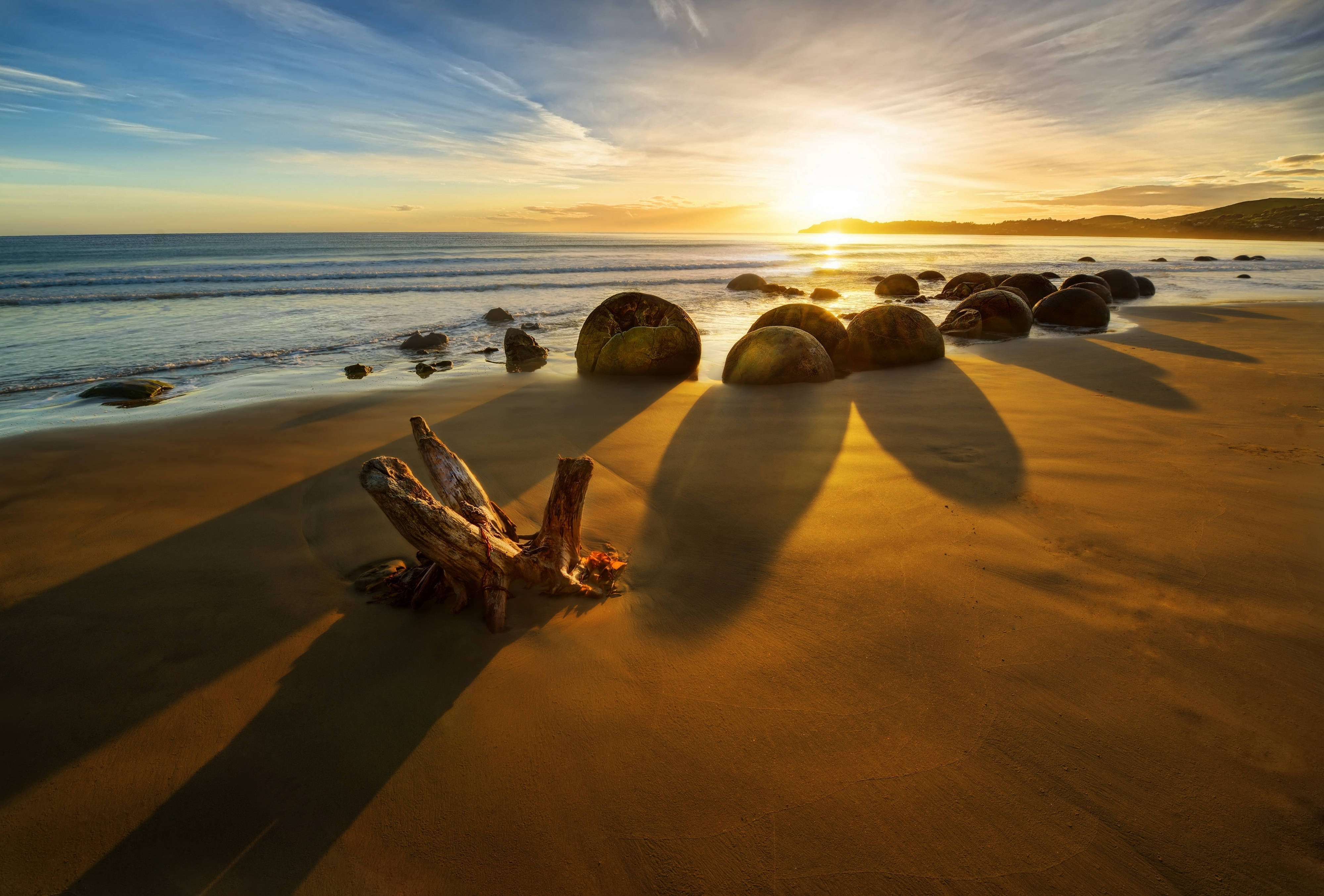 Solopgang ved stranden i New Zealand Wallpapers