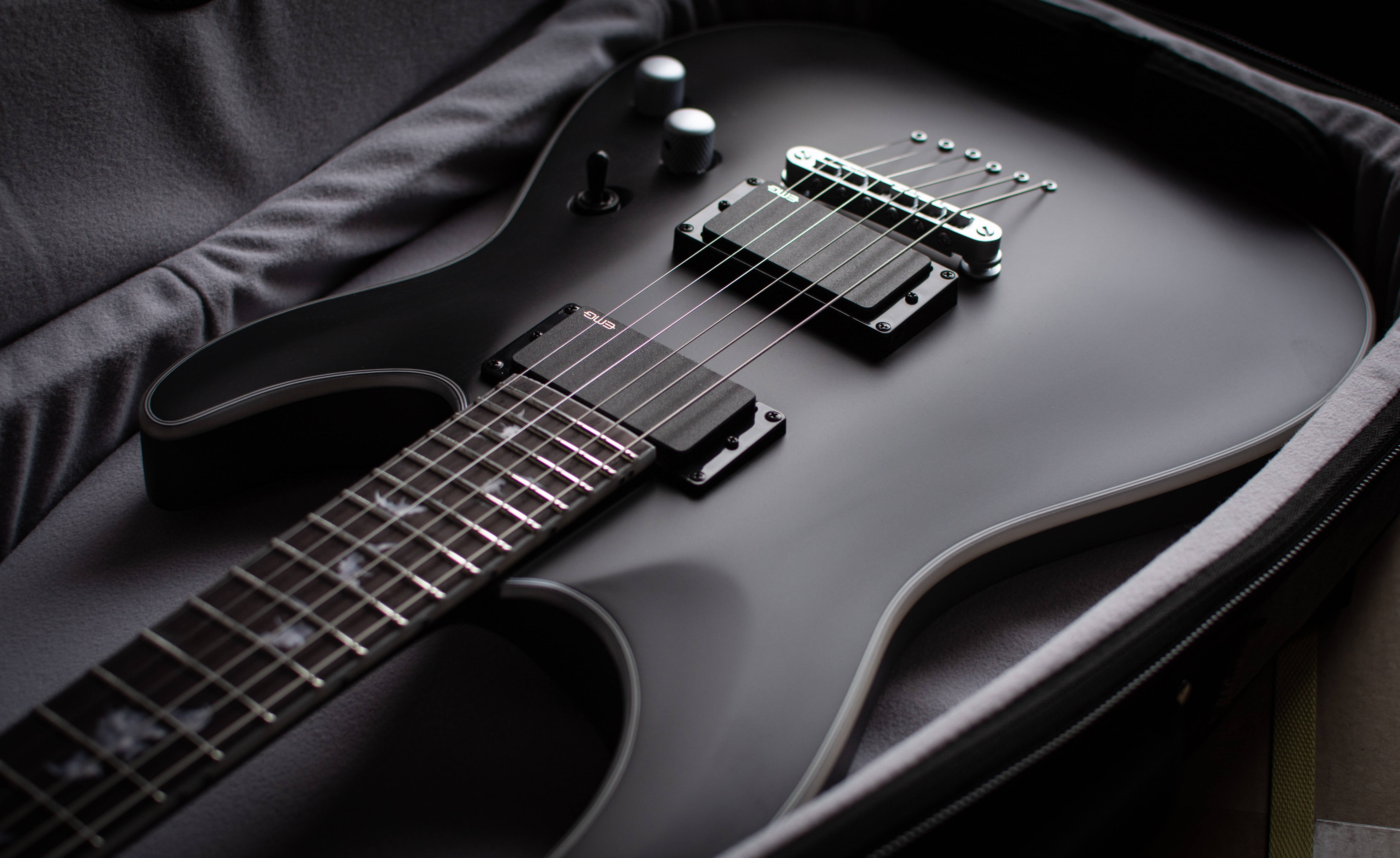 Sort elguitar med æstetisk musik Wallpapers
