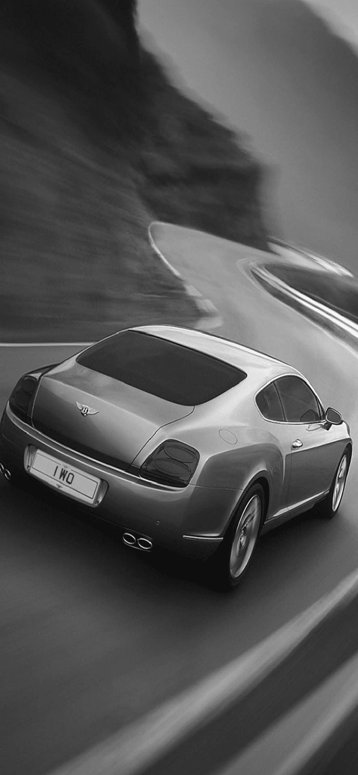 Sæt dig bag rattet og oplev overlegen luksus med iPhone Xs Max Bentley Wallpapers