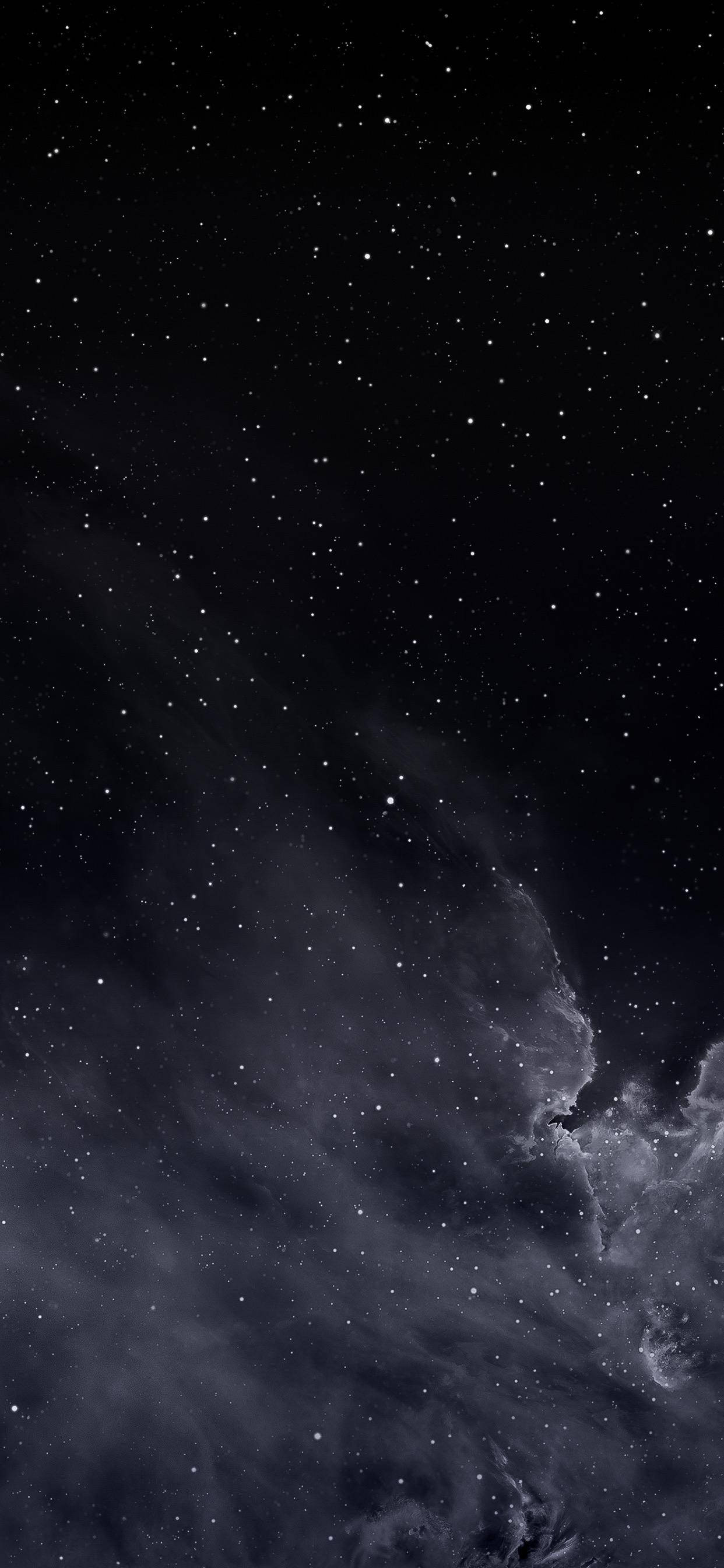 Stjerner på en skyet himmel i mørk tilstand Wallpapers