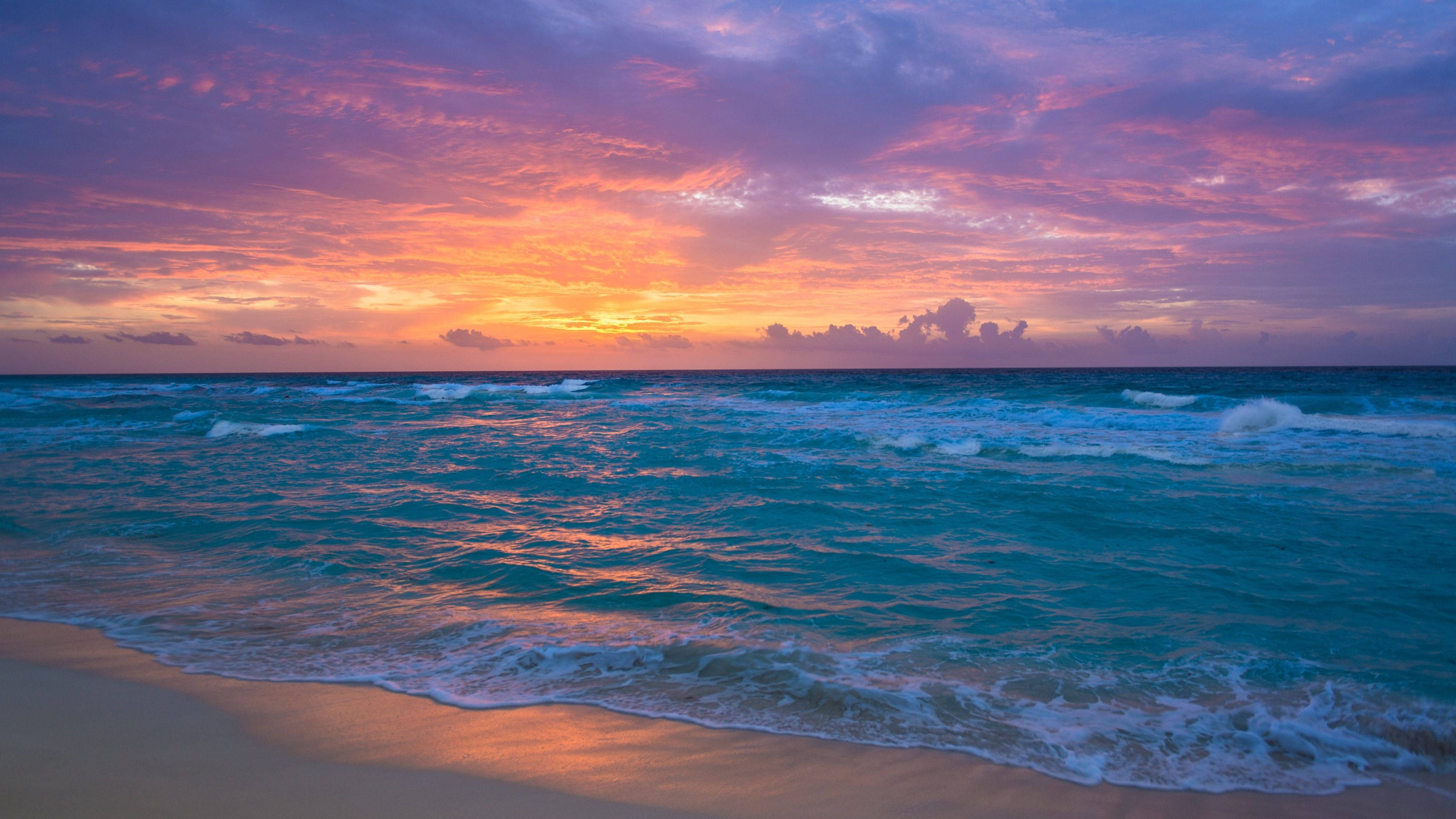 Strandsolnedgang til gratis iPad Wallpapers