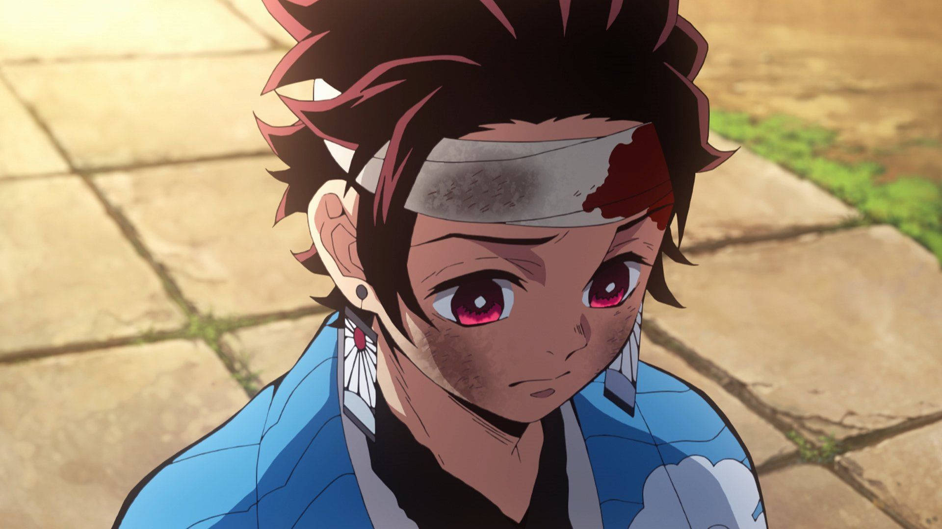 Tanjiro, såret efter en kamp i Demon Slayer Wallpapers