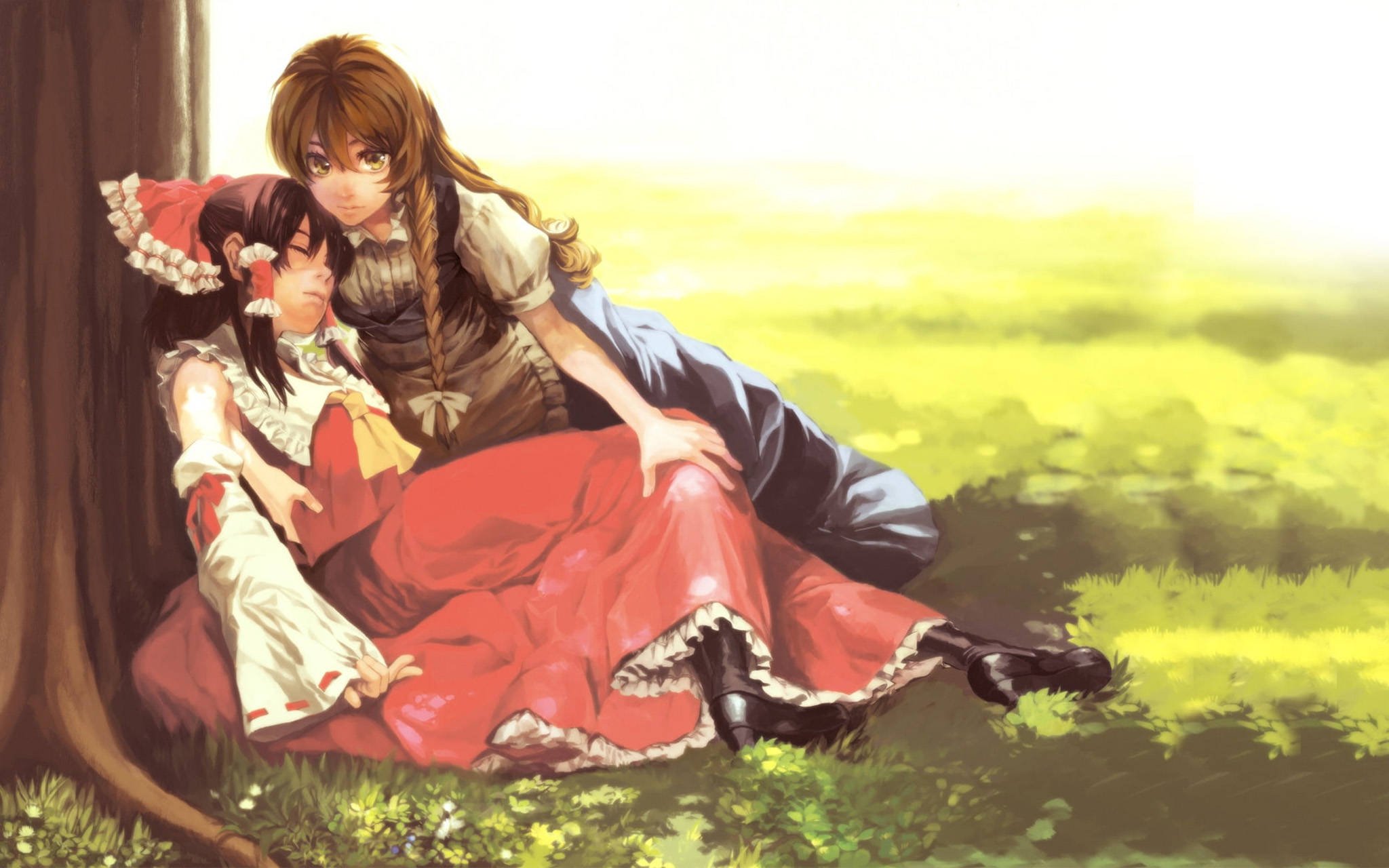 To animekarakterer, Reimu og Marisa, i et inderligt omfavn Wallpapers