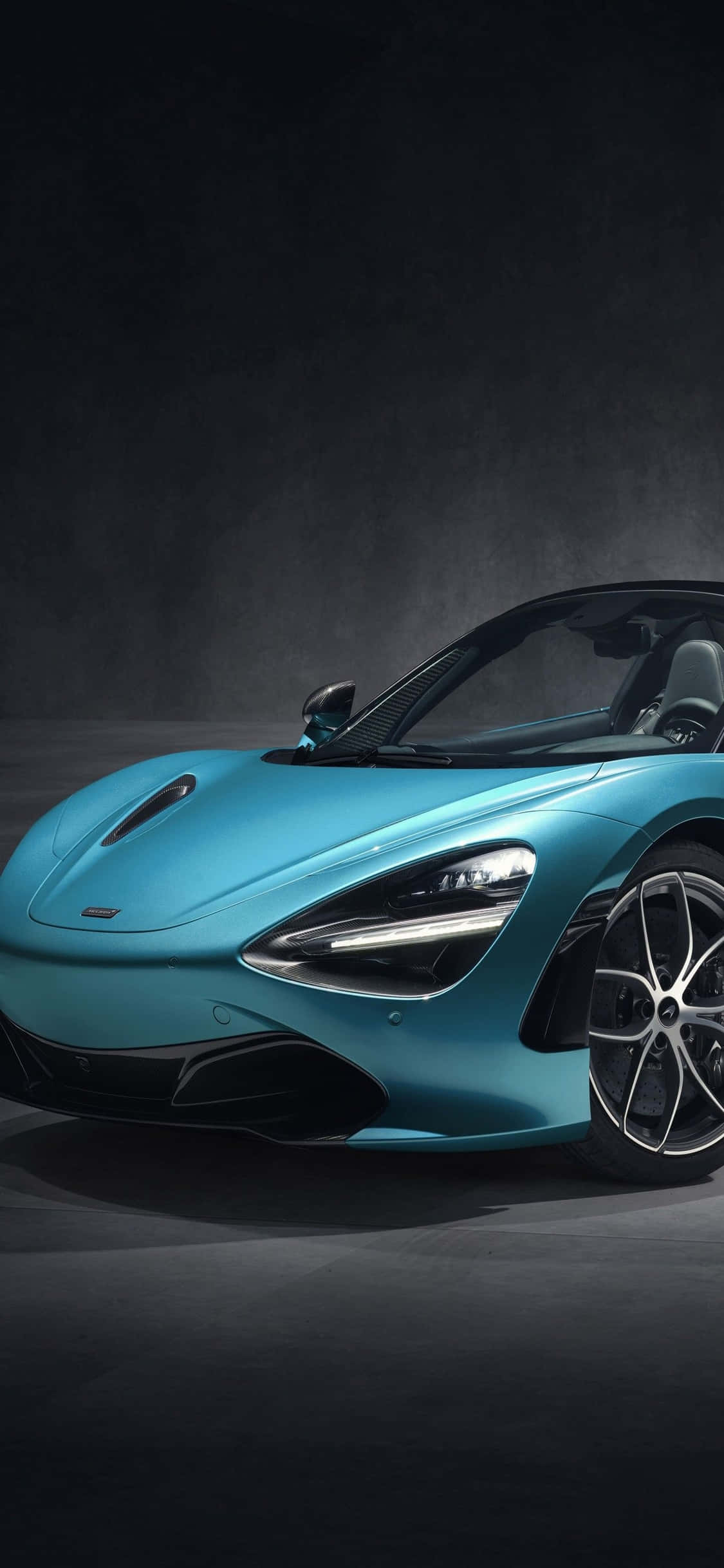 To ikoner for fart og ydeevne, iPhone Xs og McLaren 720s Wallpapers