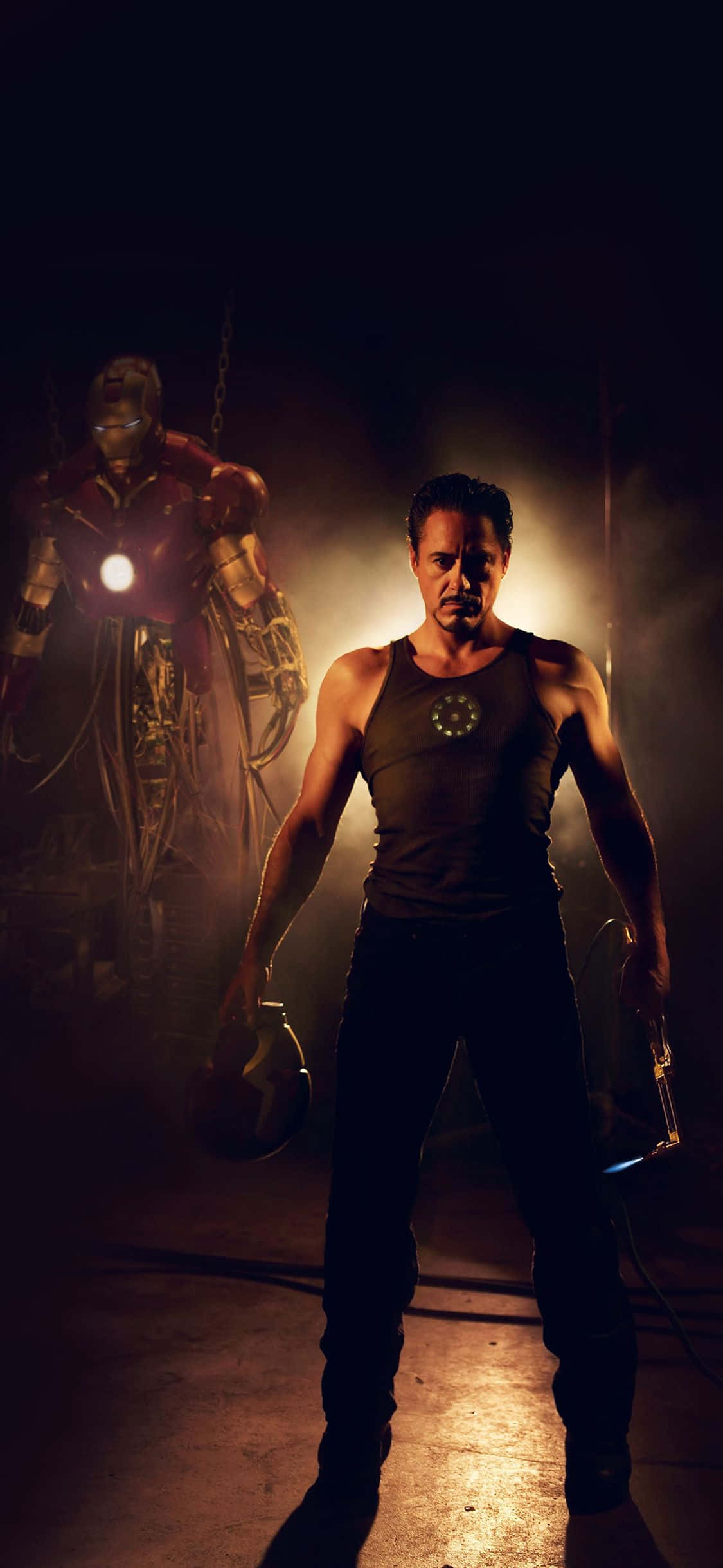 Gå ind i teknologiens tidsalder med Iron Mans Apple iPhone X Wallpapers