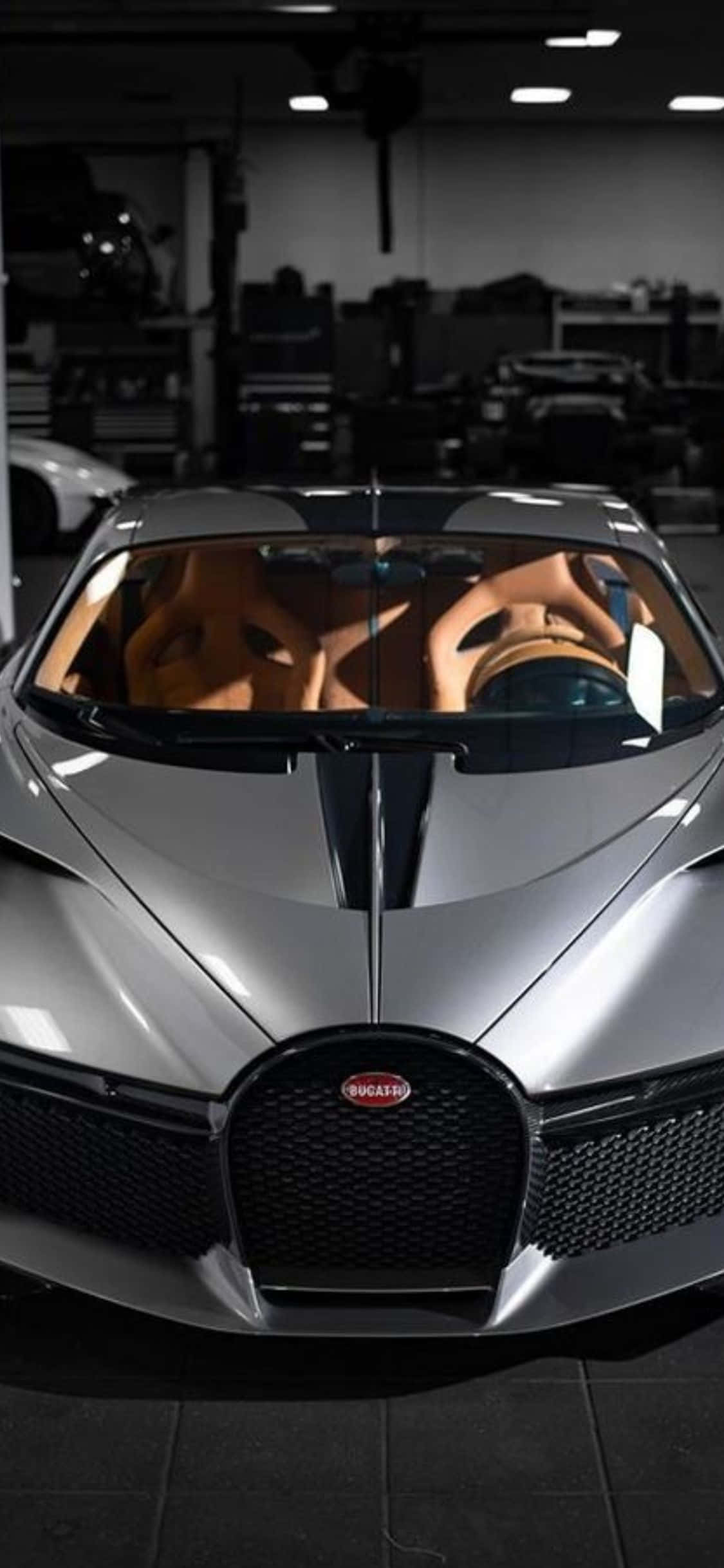 Unik luksus: udforsk verden med en personlig iPhone Xs og Bugatti Wallpapers