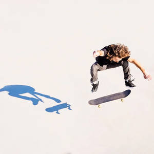 Æstetisk skygge af skateboard-dreng tapet