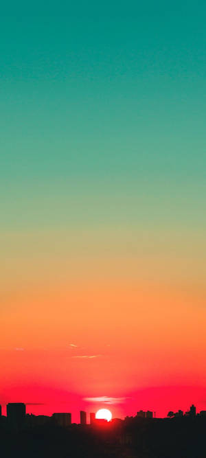 Turkis og rød solnedgangshimmel tapet — iPhone 16 Pro Wallpapers
