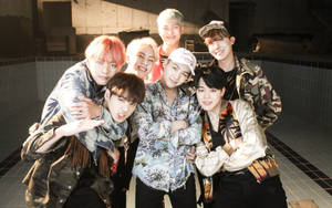 BTS-gruppebillede i Fire-musikvideoen wallpaper — Bts gruppebillede GIF Wallpapers