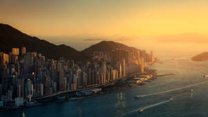 Smuk Hongkong bybillede med solnedgang tapet. — 1600x900 Wallpapers