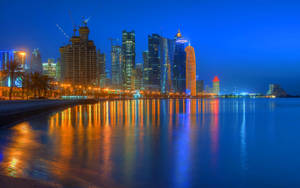 Baggrundsbillede af Doha Corniche i Qatar — Skumring Wallpapers