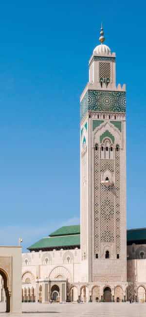 Fængslende udsigt over Hassan II-moskeen ved solnedgang — Xiaomi 15S Pro Wallpapers