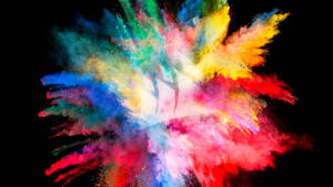 Farverig malingsbombe, der eksploderer som tapet. — 1600x900 Wallpapers